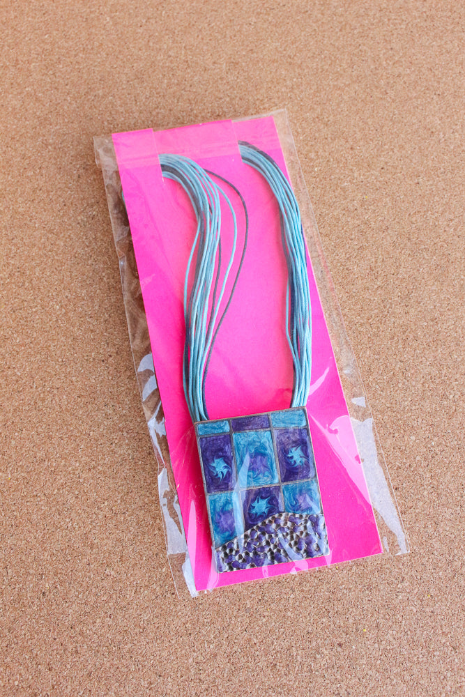 Blue enameled pendant