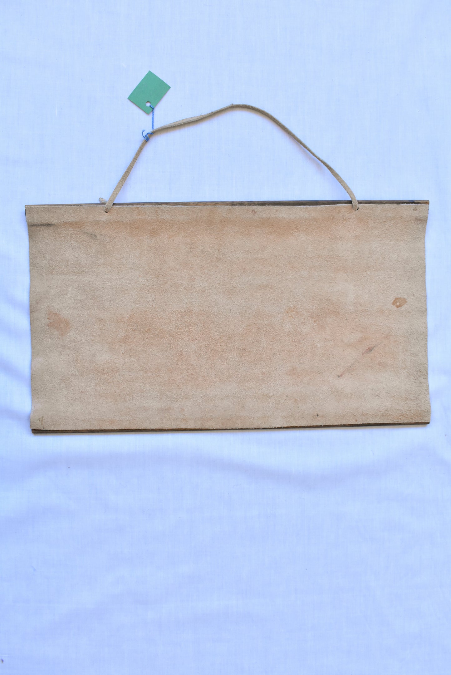 Embossed suede cat wall hanging