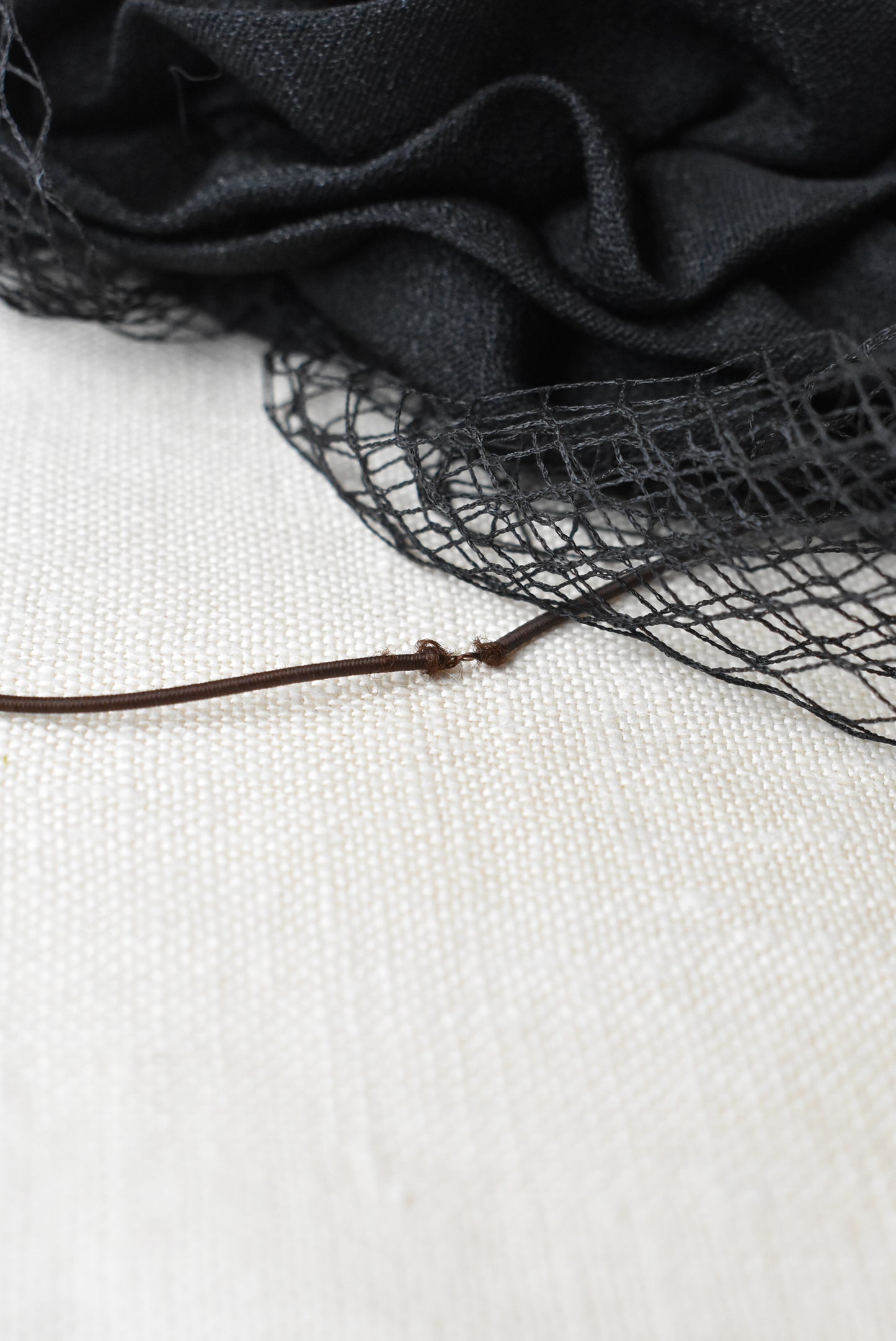 Black ruffle fascinator