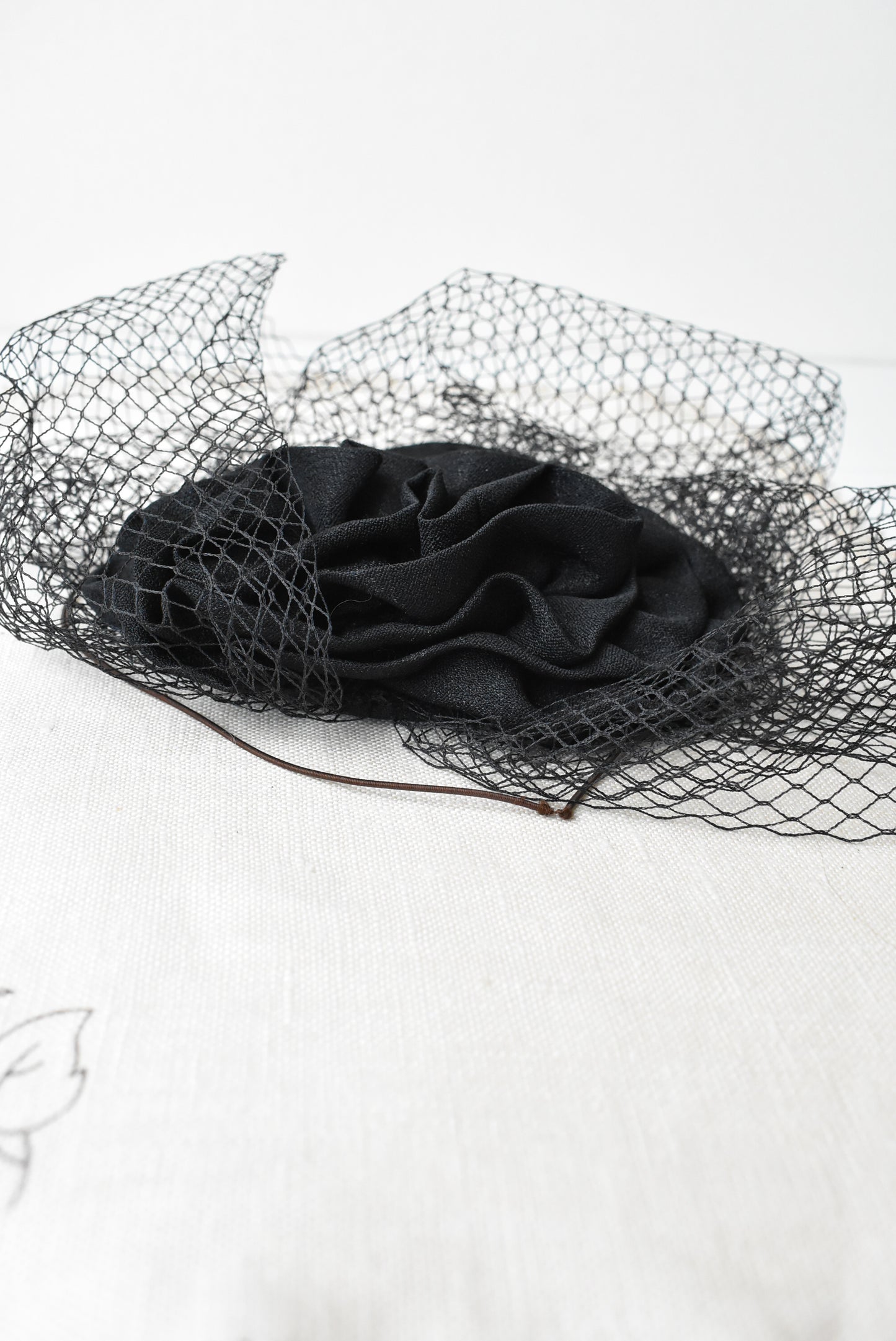 Black ruffle fascinator