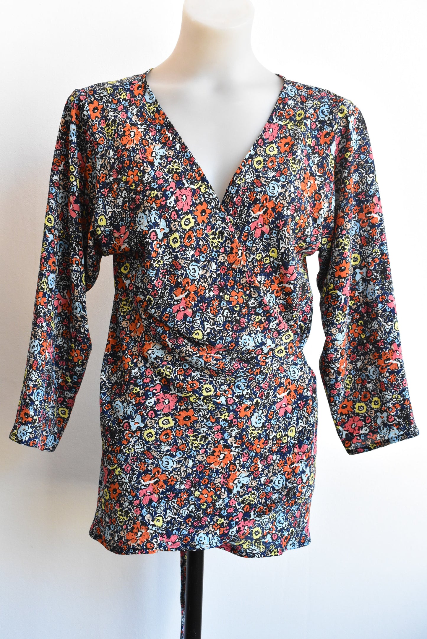 Carly Harris dark blue and orange florals wrap top