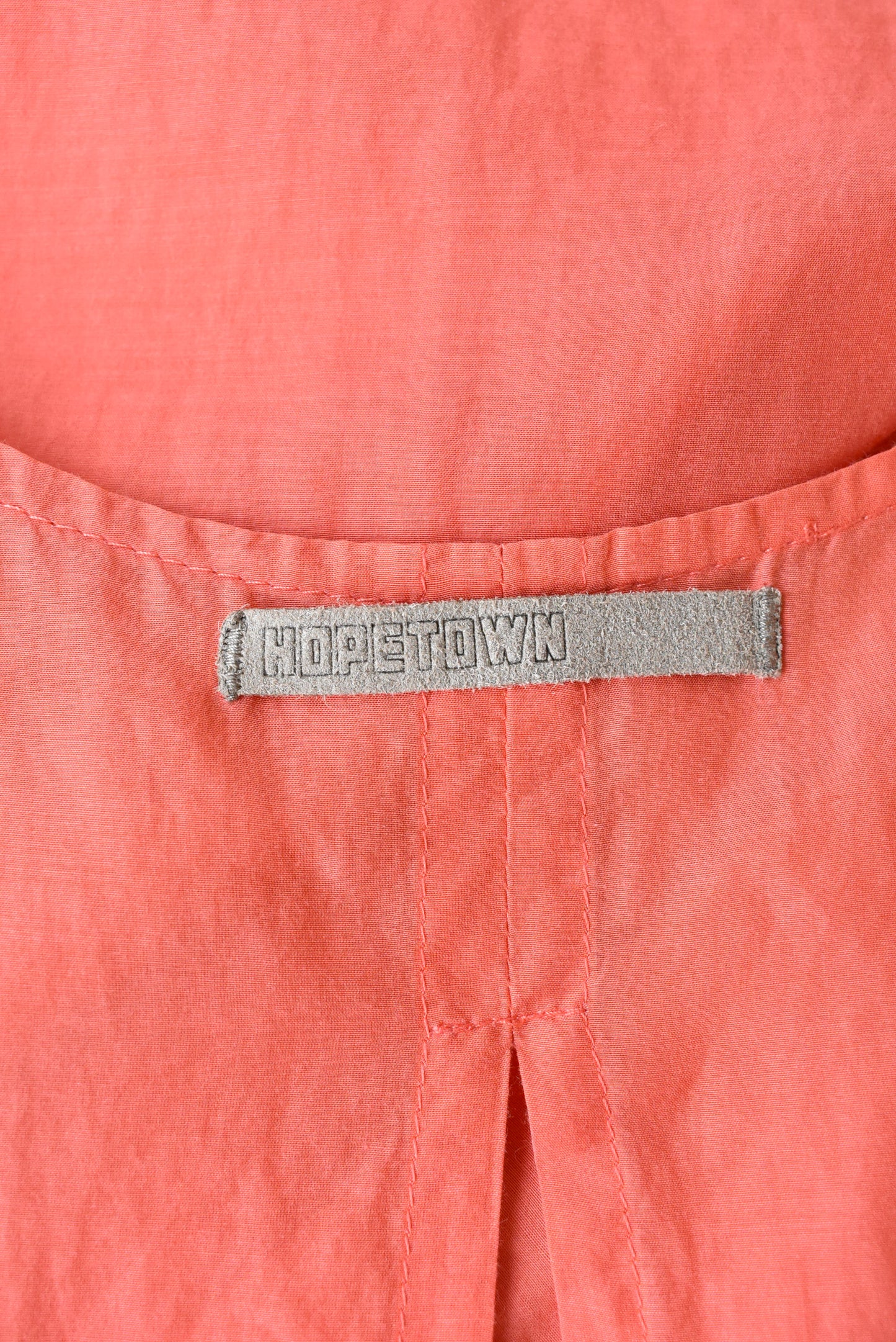 Hopetown coral silk sleeveless dress with front paneling. M