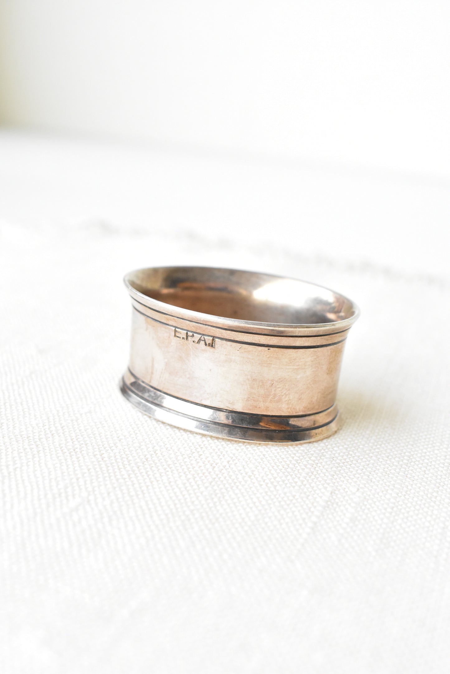 Silver coloured napkin holder
