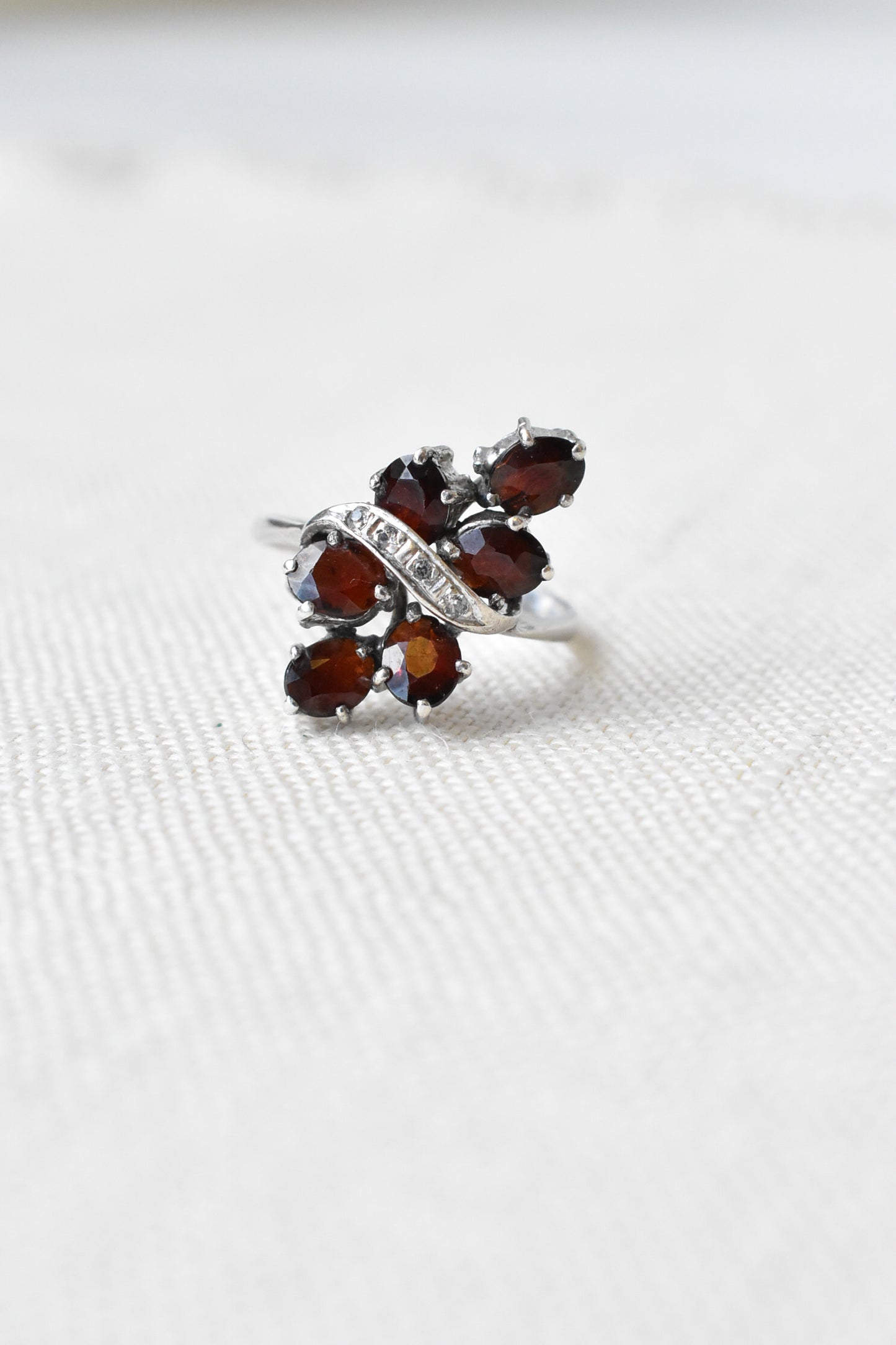 Diamond and garnet cluster costume ring