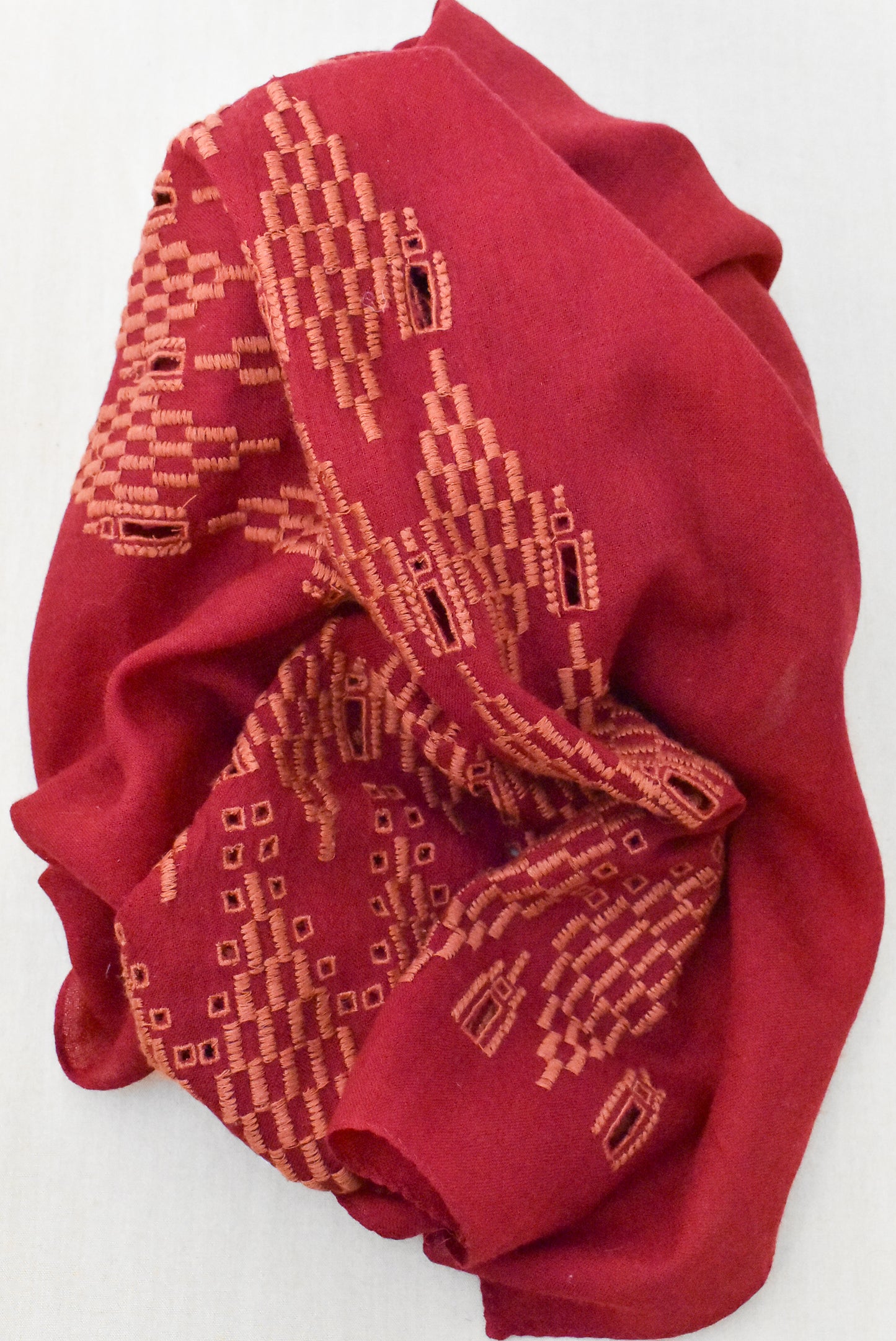 Long red embroidered scarf