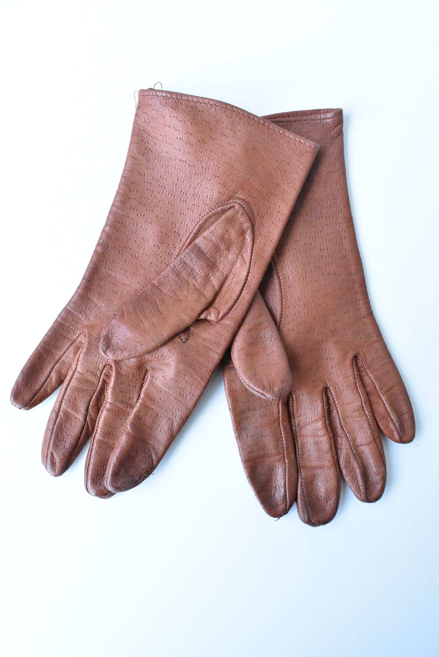 Tan leather gloves
