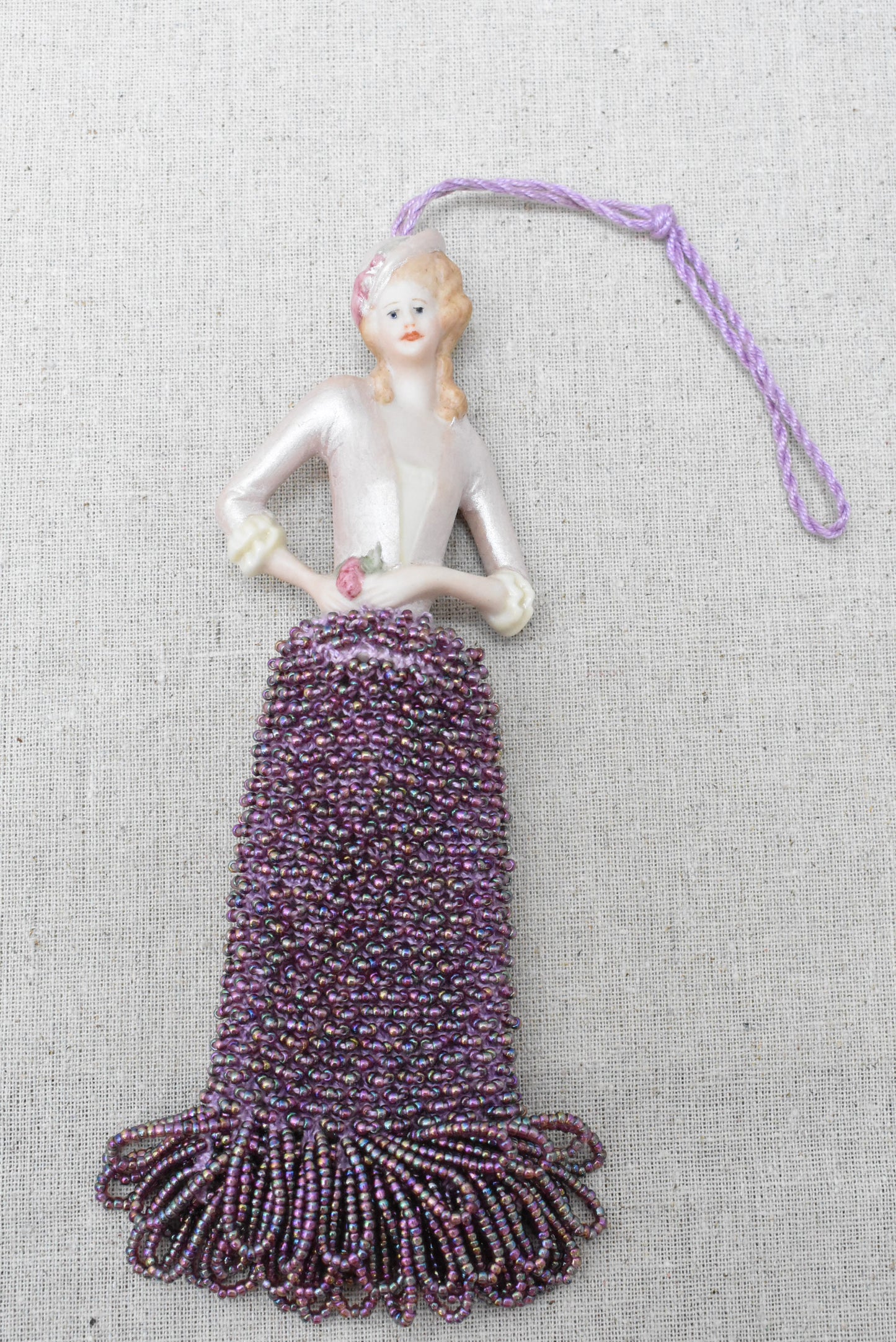 Lady with a beaded skirt Christmas ornament