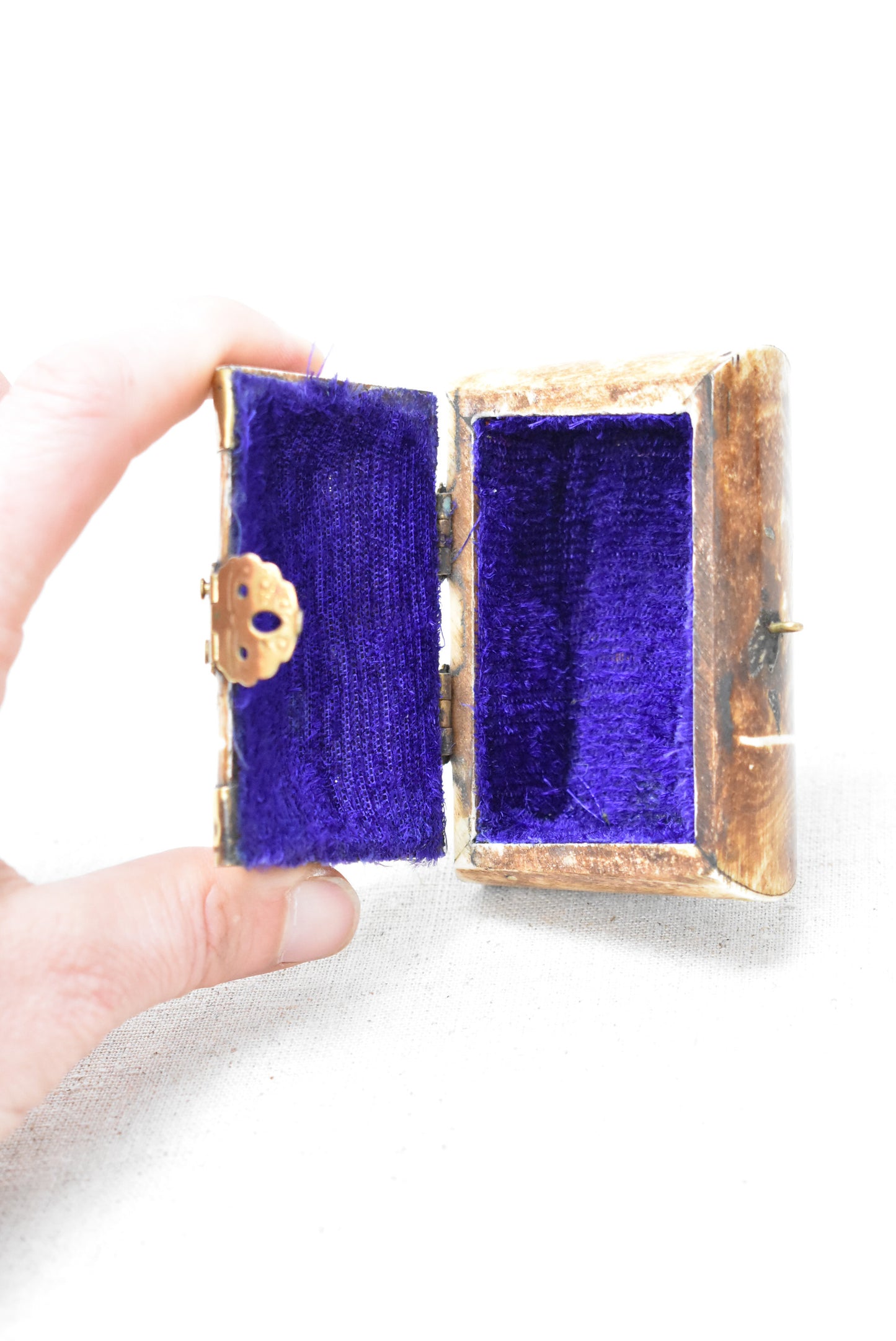 Stone jewellery box with purple lining