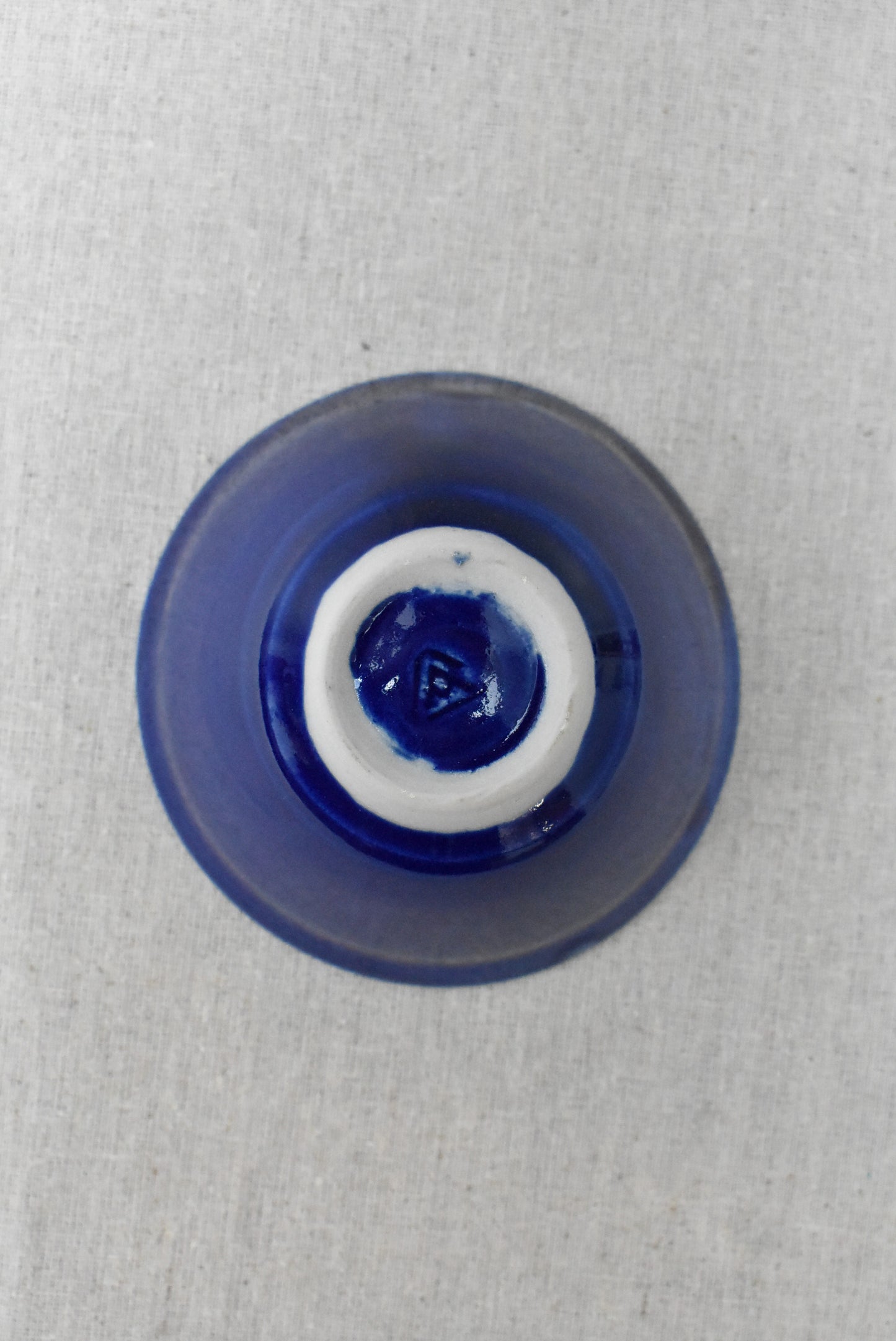 Small deep blue glazed ceramic bowl