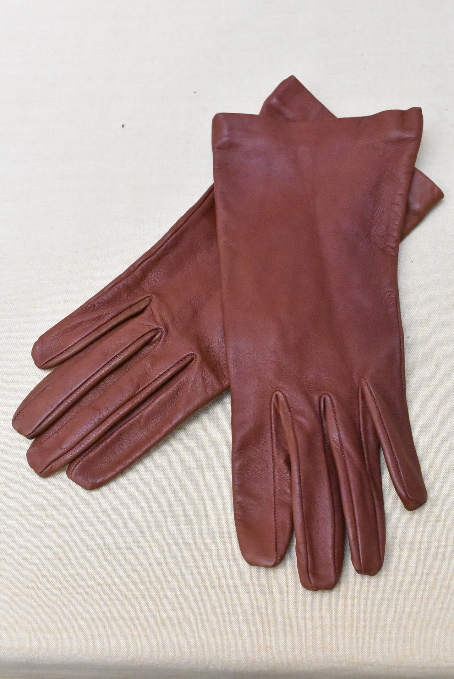 Tan leather silk lined gloves, size 7