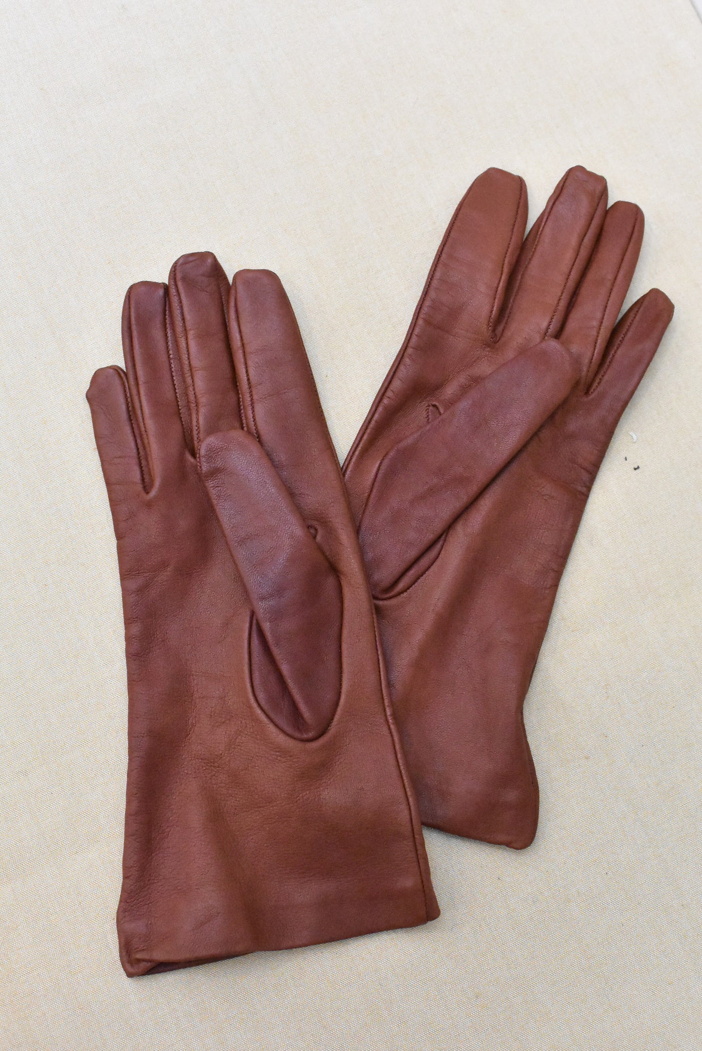 Tan leather silk lined gloves, size 7