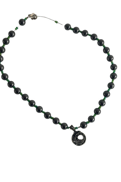 Beaded diamante koru necklace