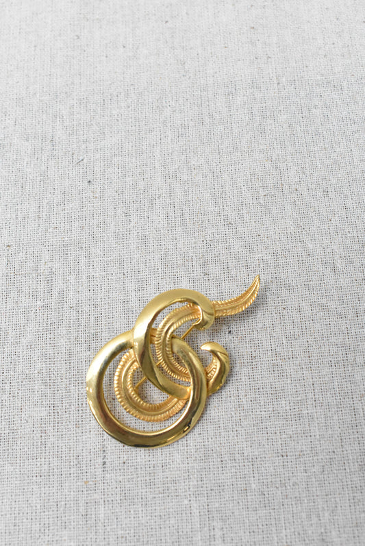 Gold toned brooch
