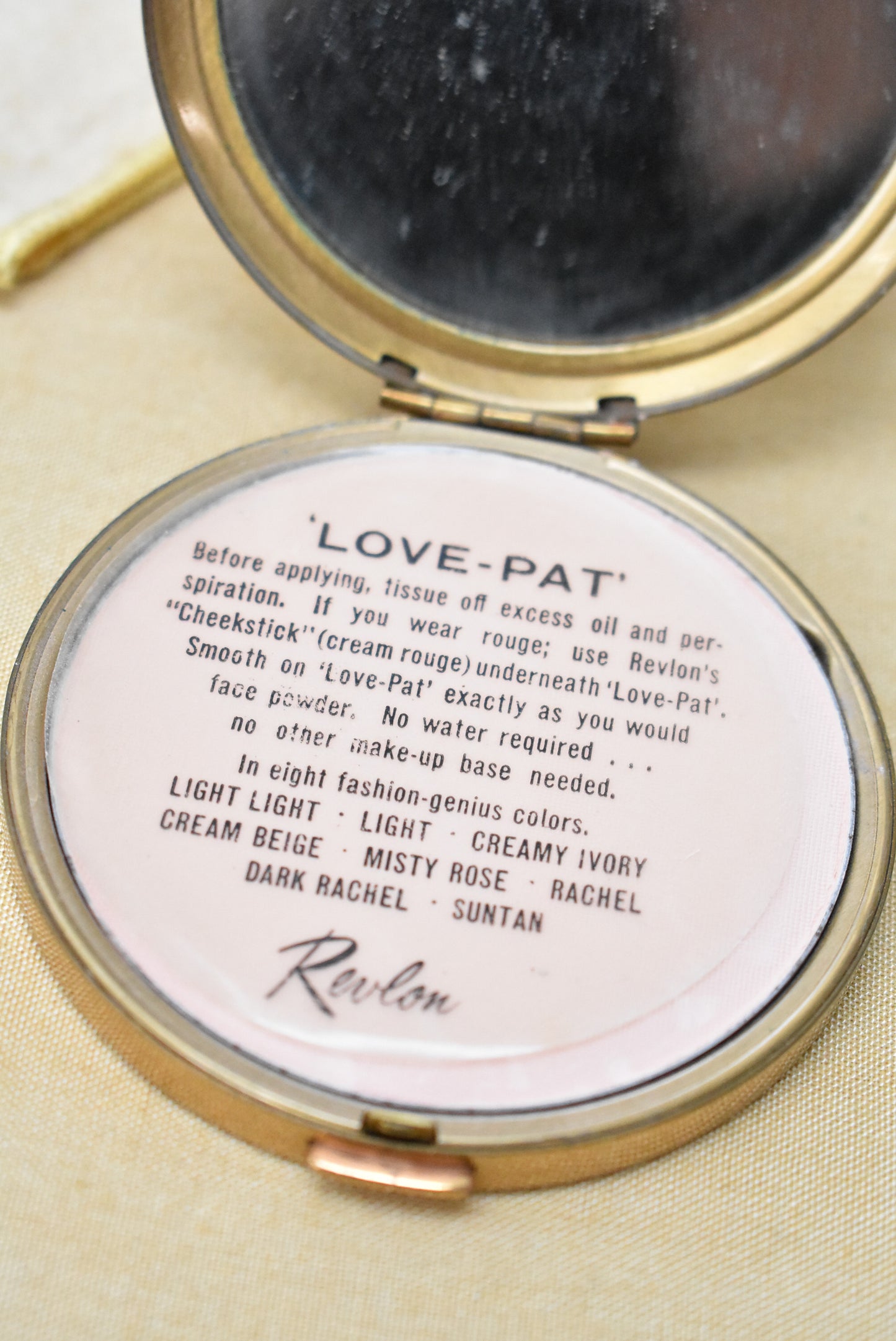 Vintage Revlon 'Love Pat' pressed powder in clamshell compact with mirror