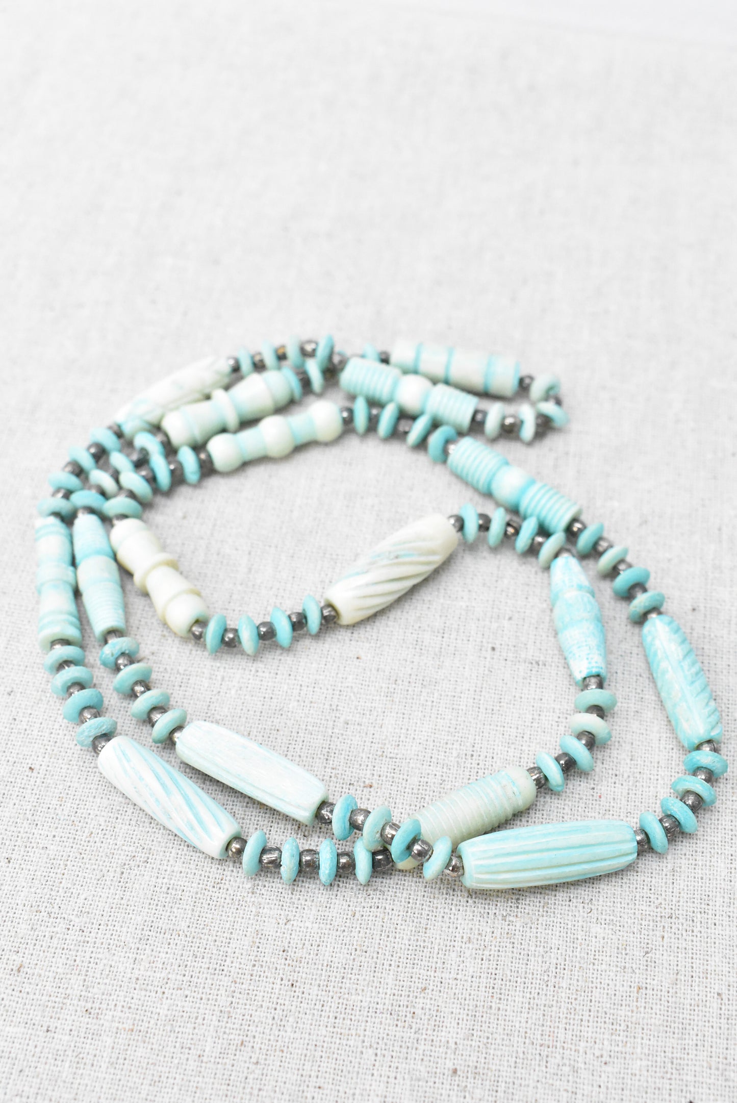 Pale pastel blue long ceramic beaded necklace