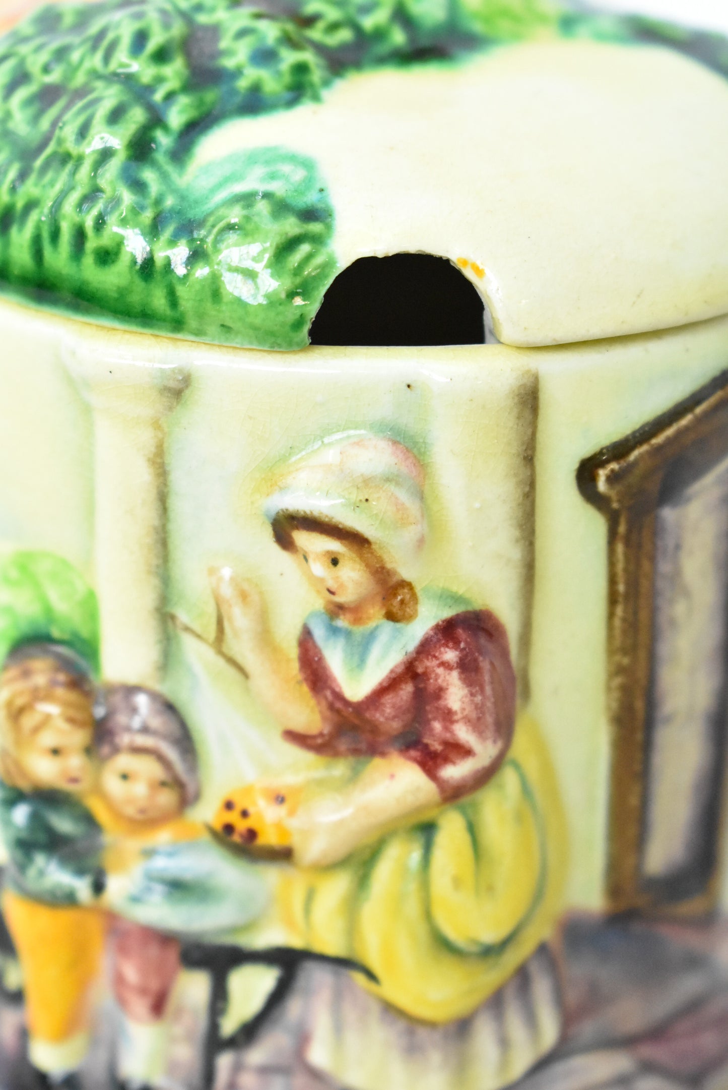 Vintage jam pot depicting English countryside