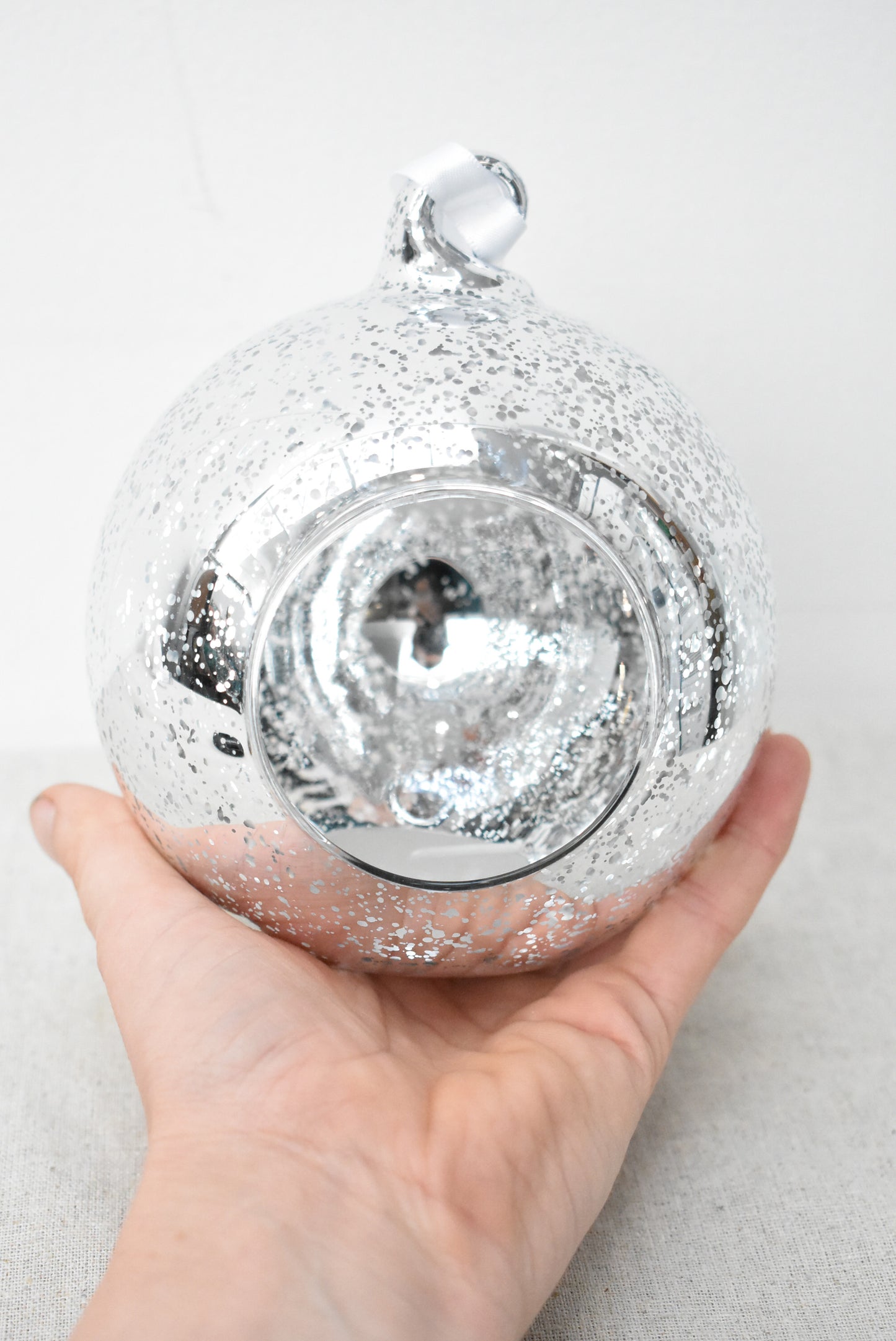 The Aromatherapy Company, hanging silver tealight holder