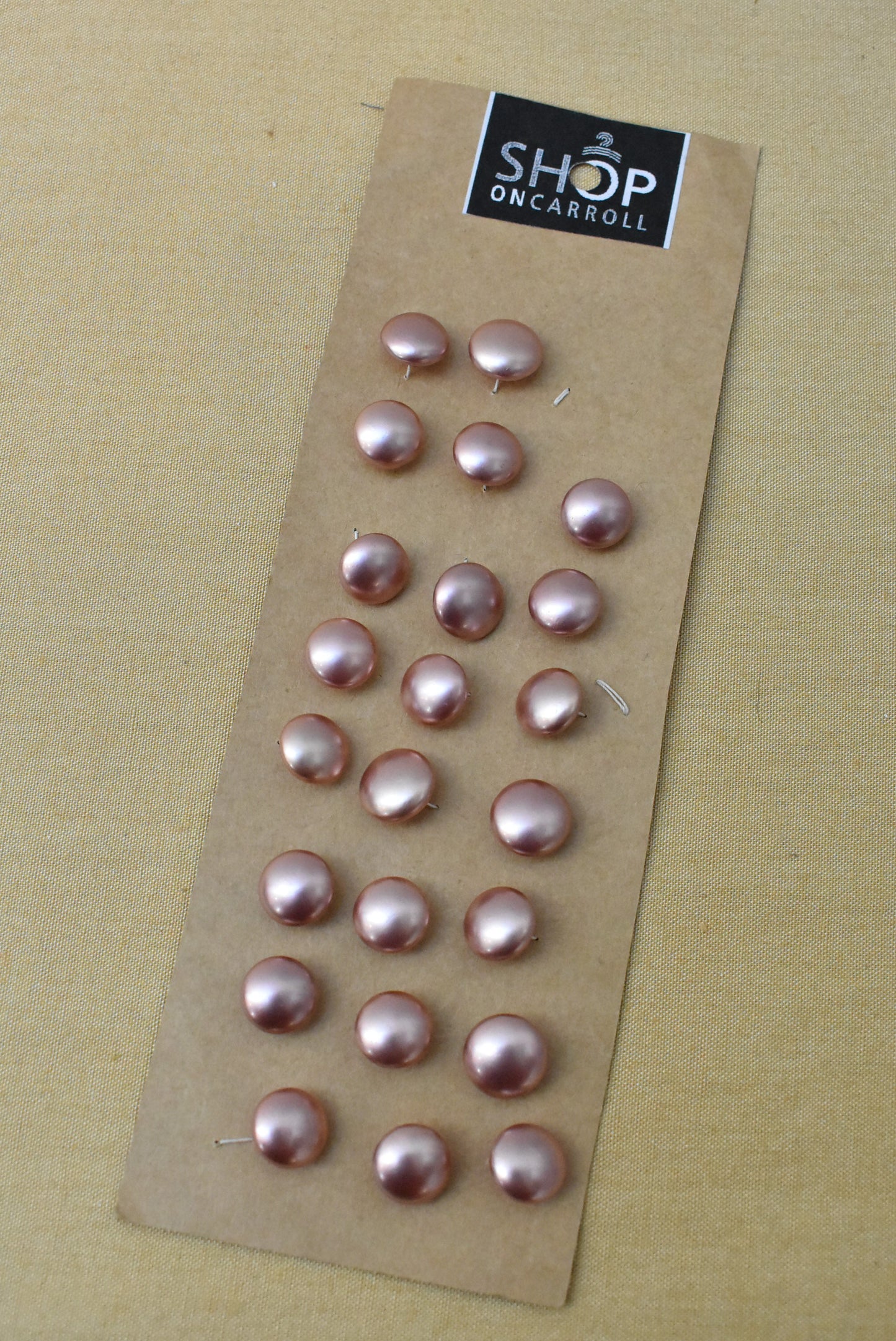 Vintage pink plastic buttons