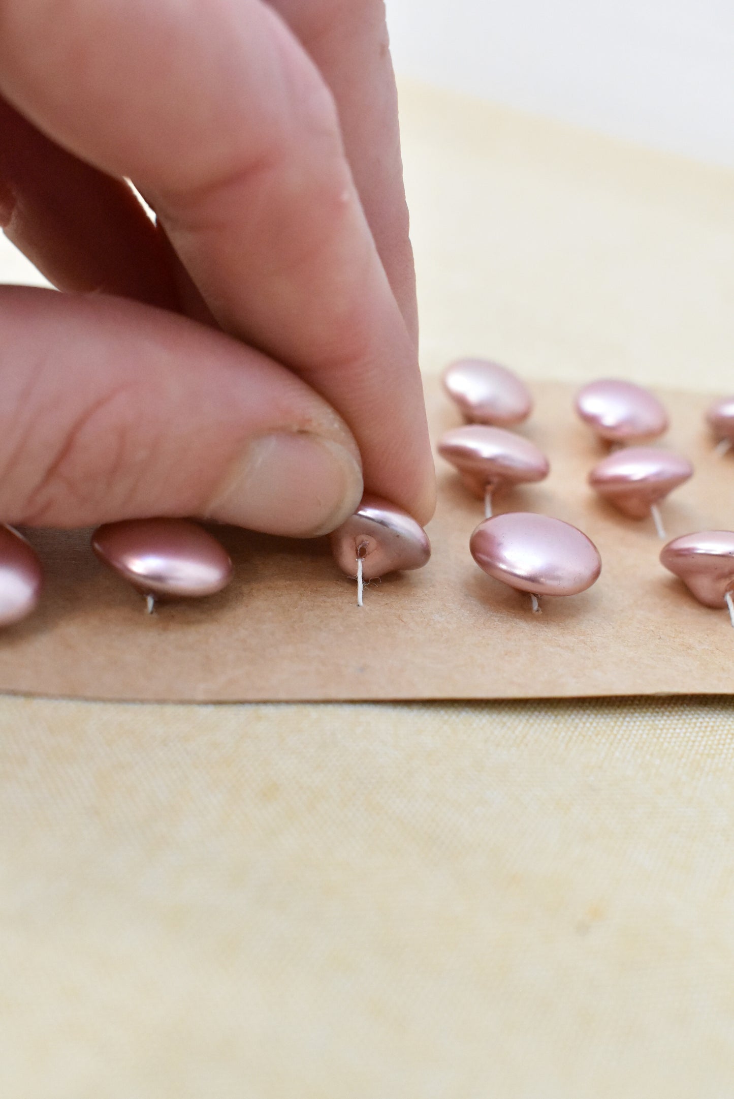 Vintage pink plastic buttons