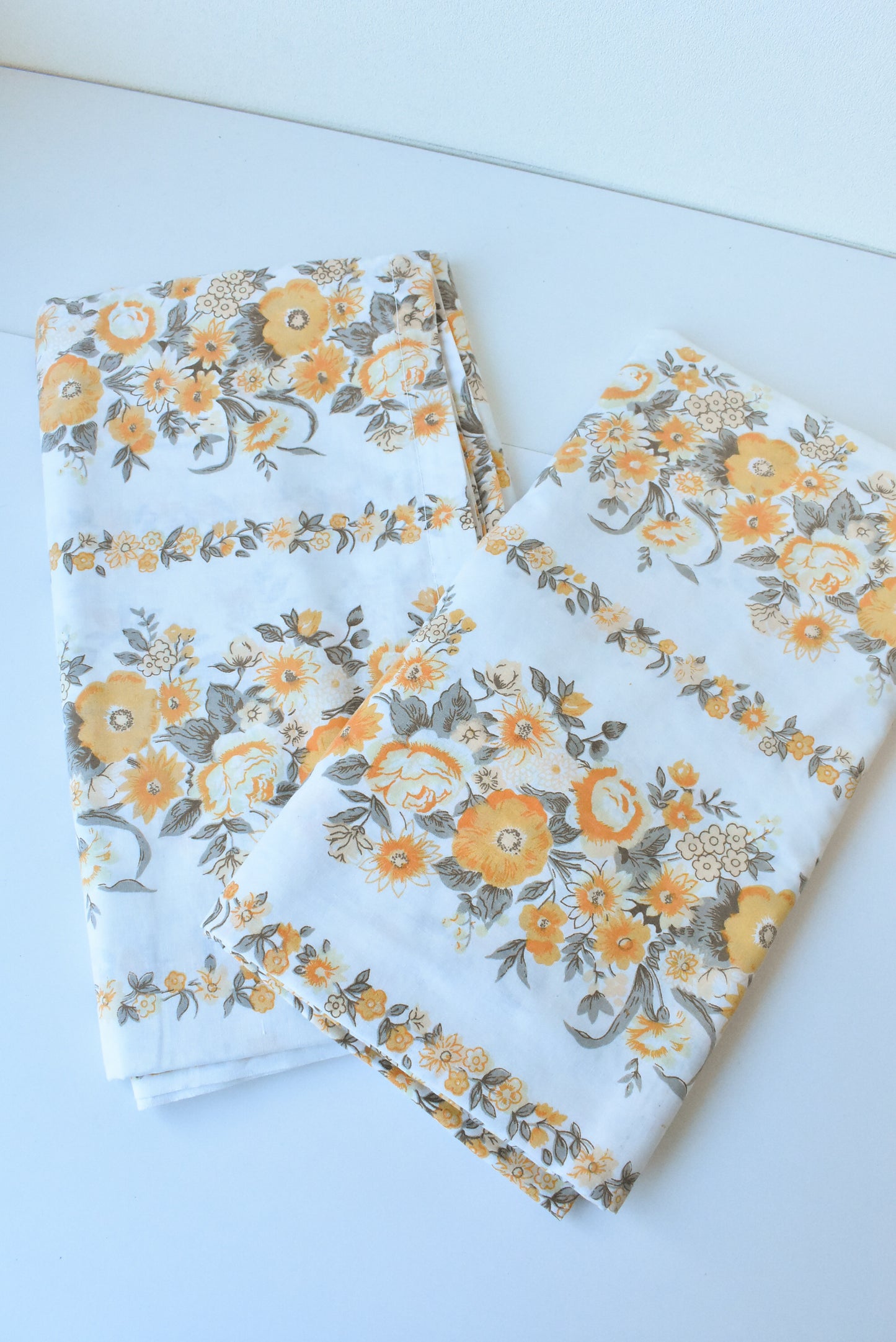 Retro pair of orange floral sheets