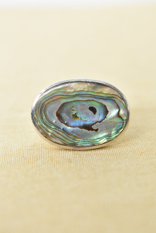 Silver and pāua ring