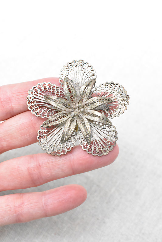 Vintage silver filigree flower brooch