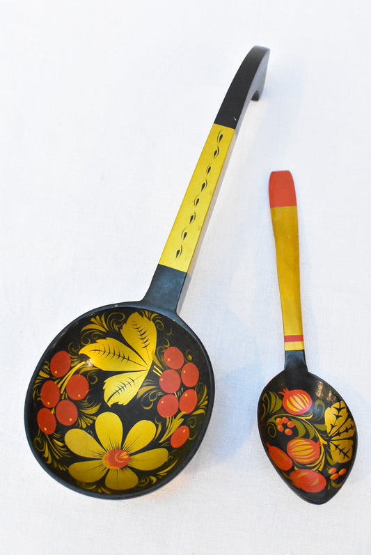 Mismatched pair of Russian hand-painted lacquered spoons