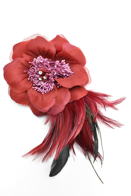 Red flower fascinator with feathers