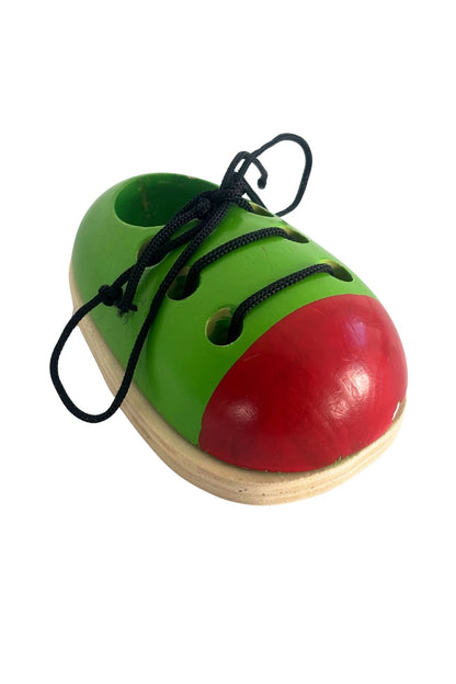 "Learn to tie your laces" wooden shoe