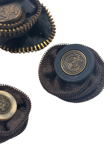 Bundle of zipper brooches