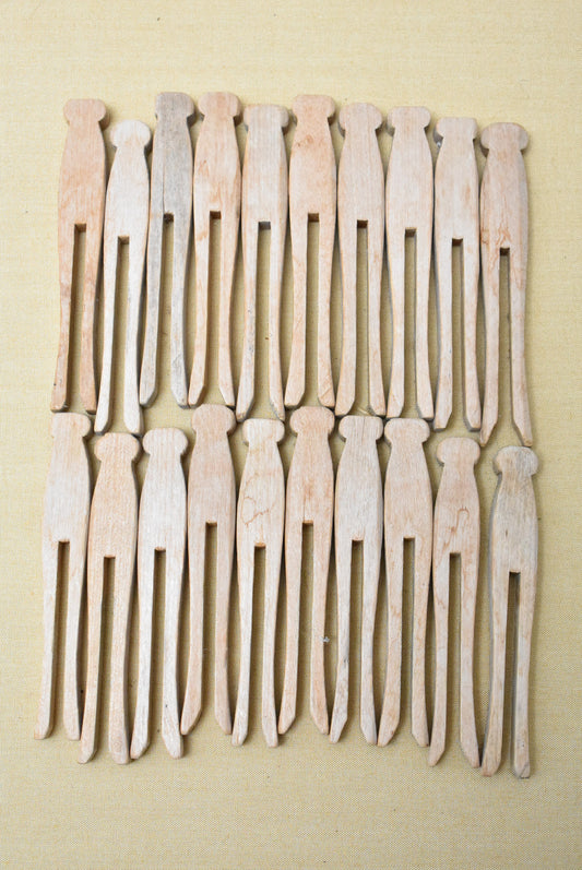 20 wooden pegs