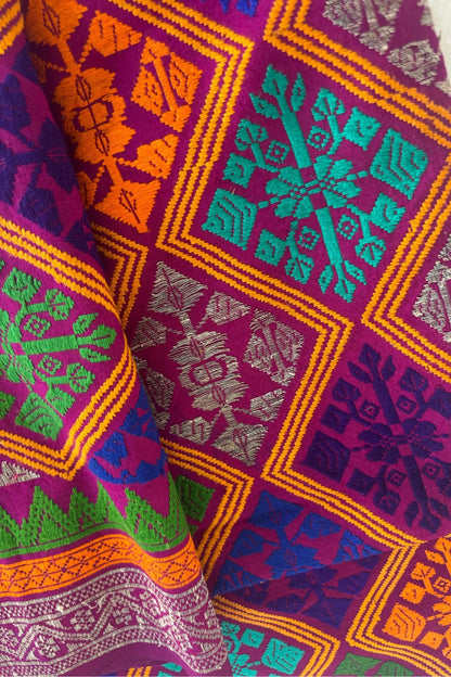 Vibrant colourful embroidered fabric