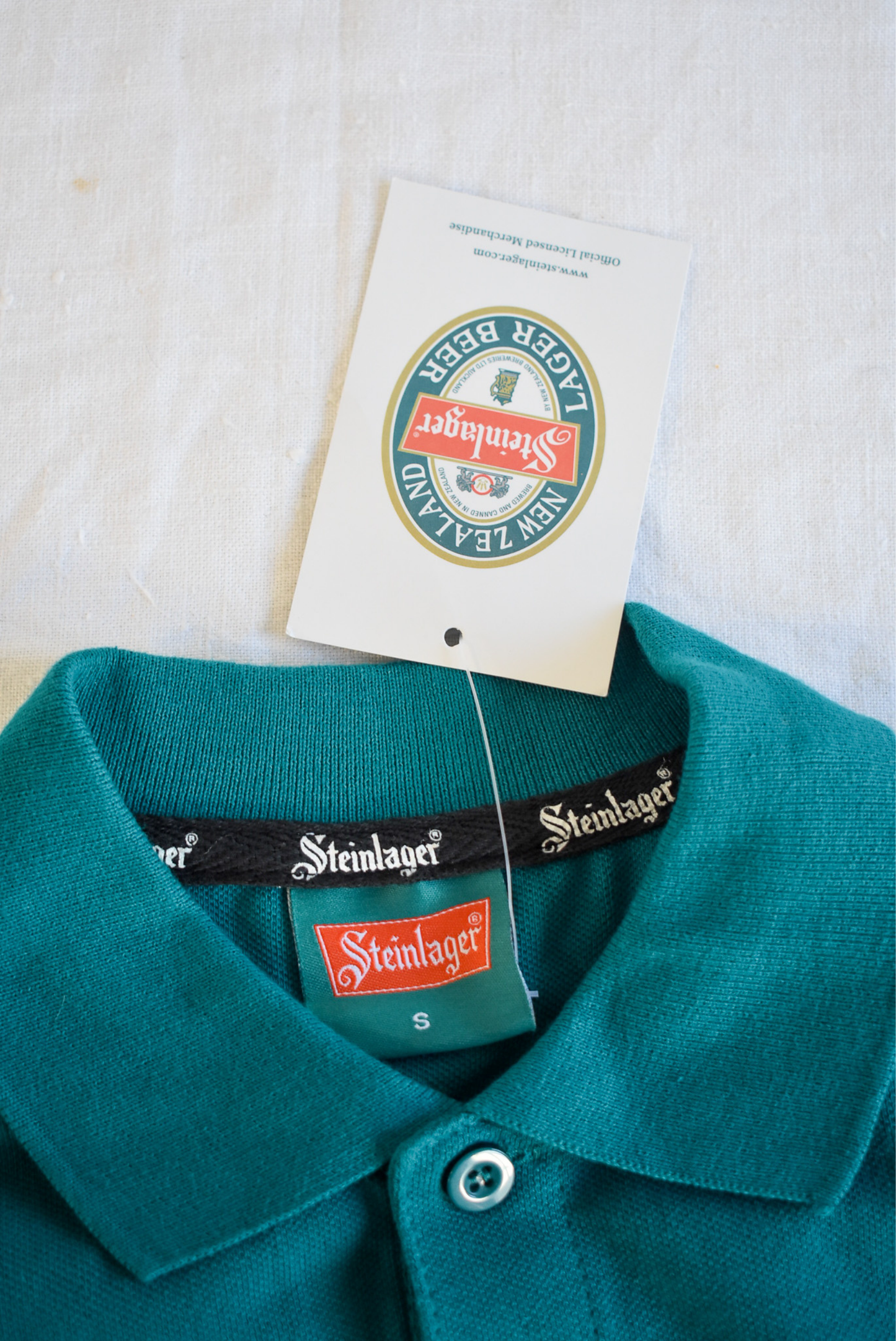Vintage Steinlager polo, S NWT
