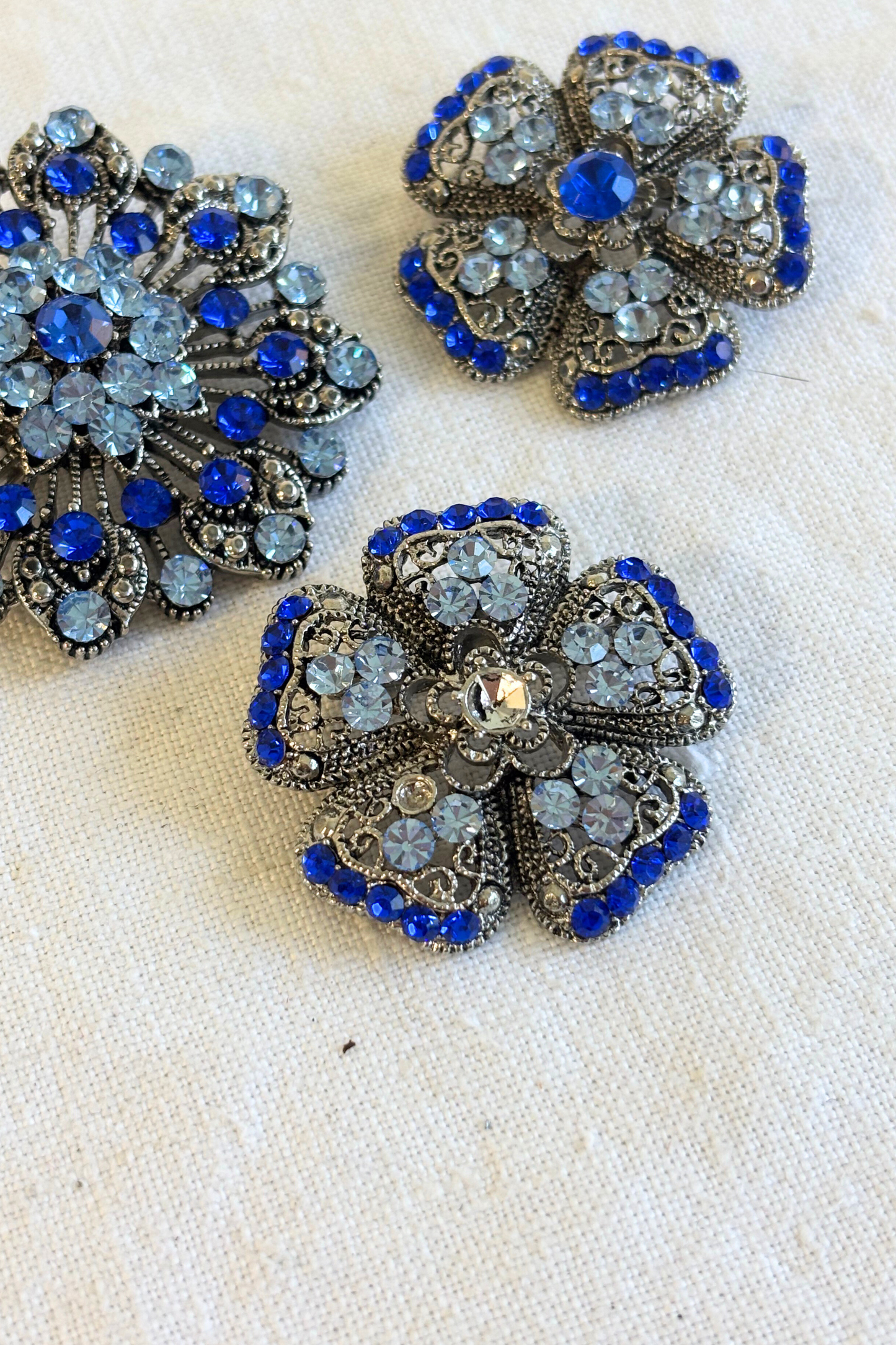 Glitzy blue brooch bundle