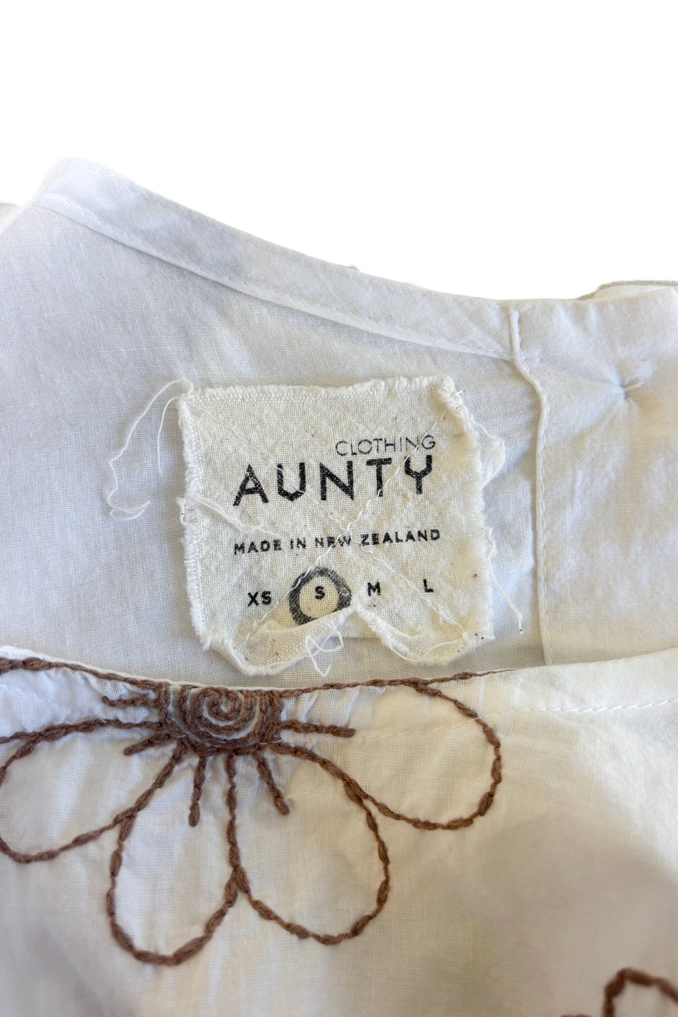 Aunty clothing NZ made cotton flower embossed top, S
