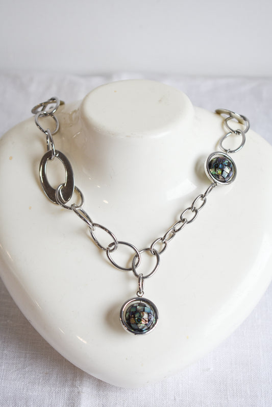 Funky silver coloured paua globe necklace