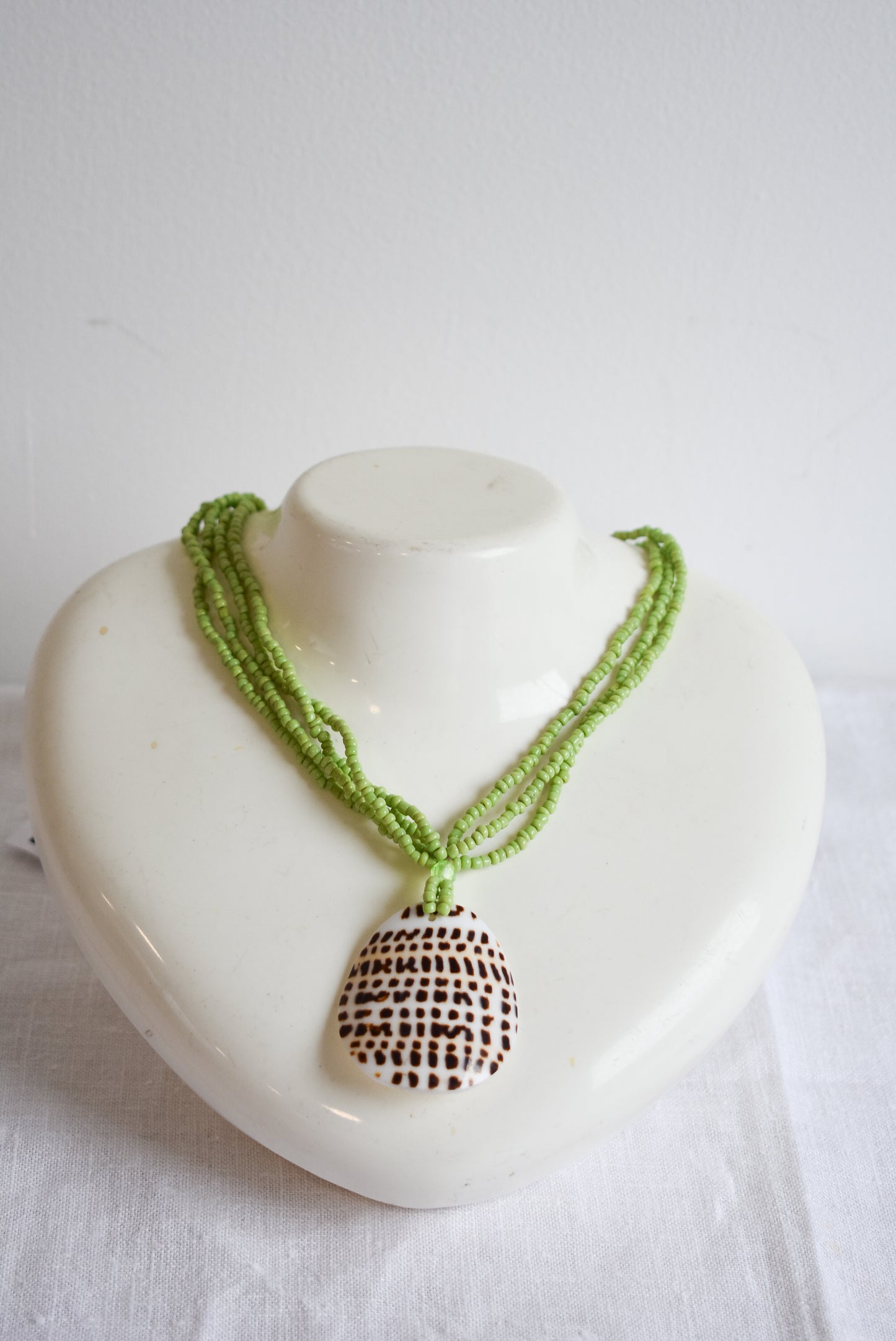 Gorgeous green beaded spotted shell necklace