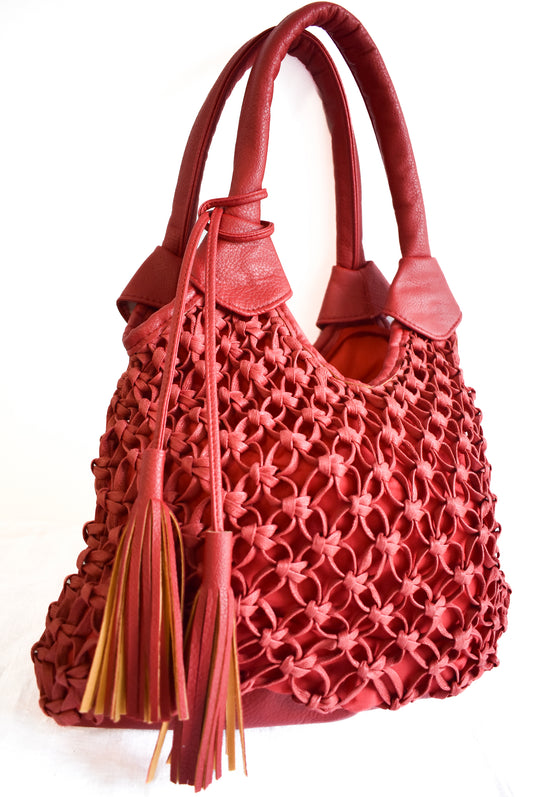 Super funky red faux leather and rope braided bag