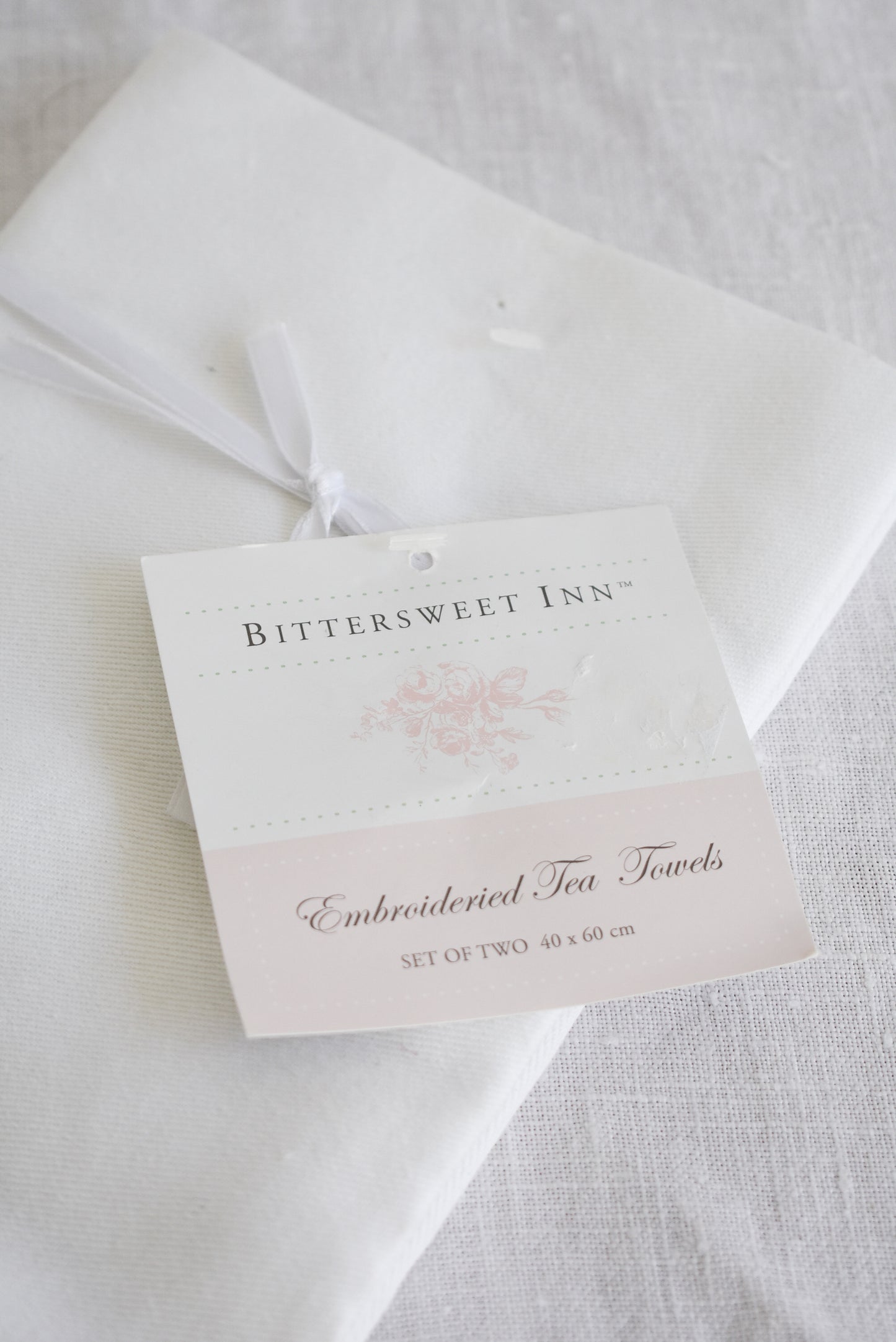 Bittersweet Inn embroidered tea towel set