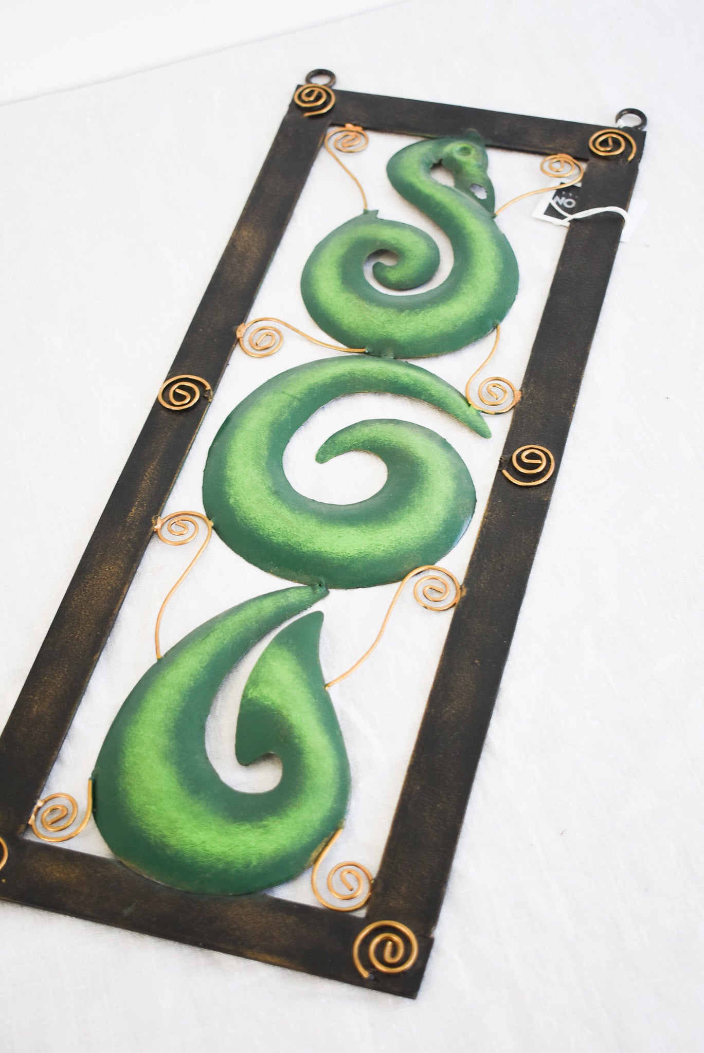 Handcrafted Koru metalwork decor