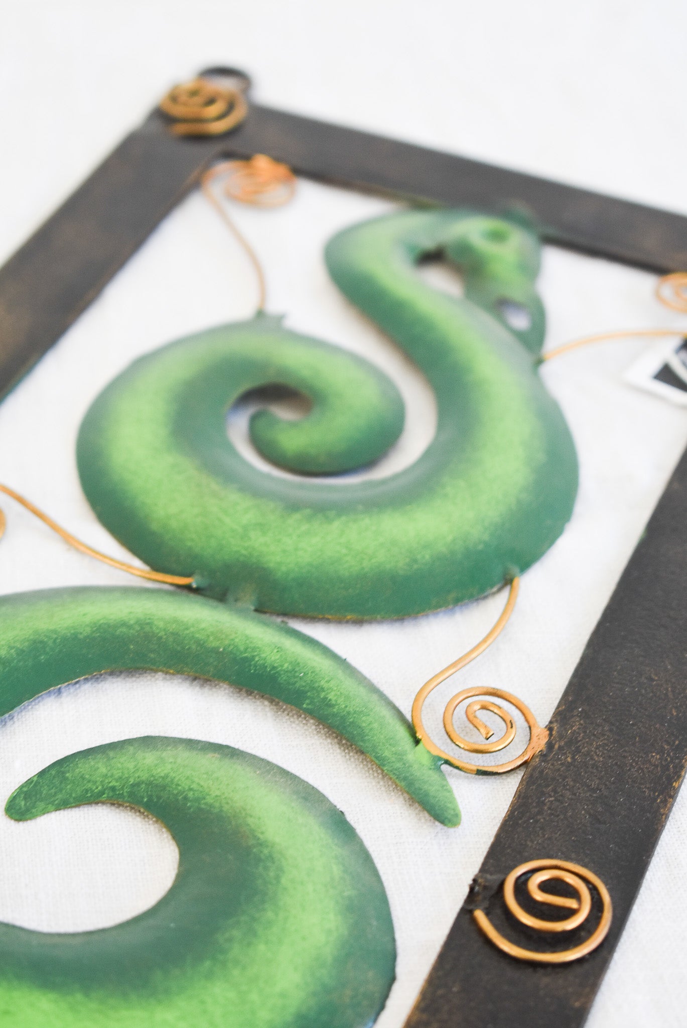 Handcrafted Koru metalwork decor