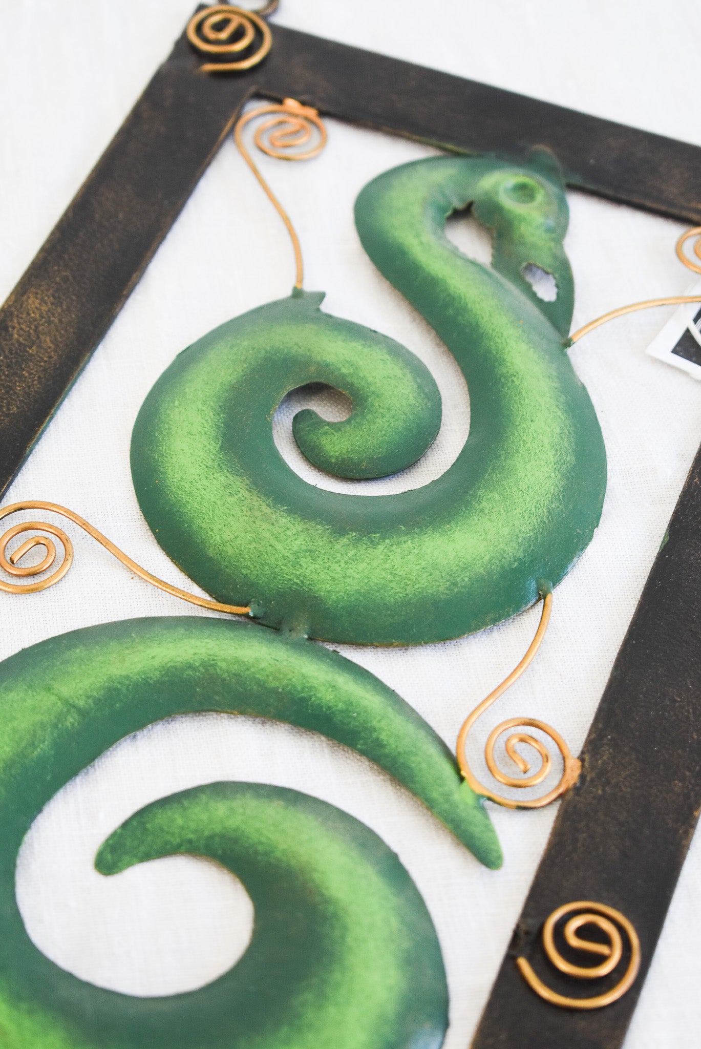 Handcrafted Koru metalwork decor