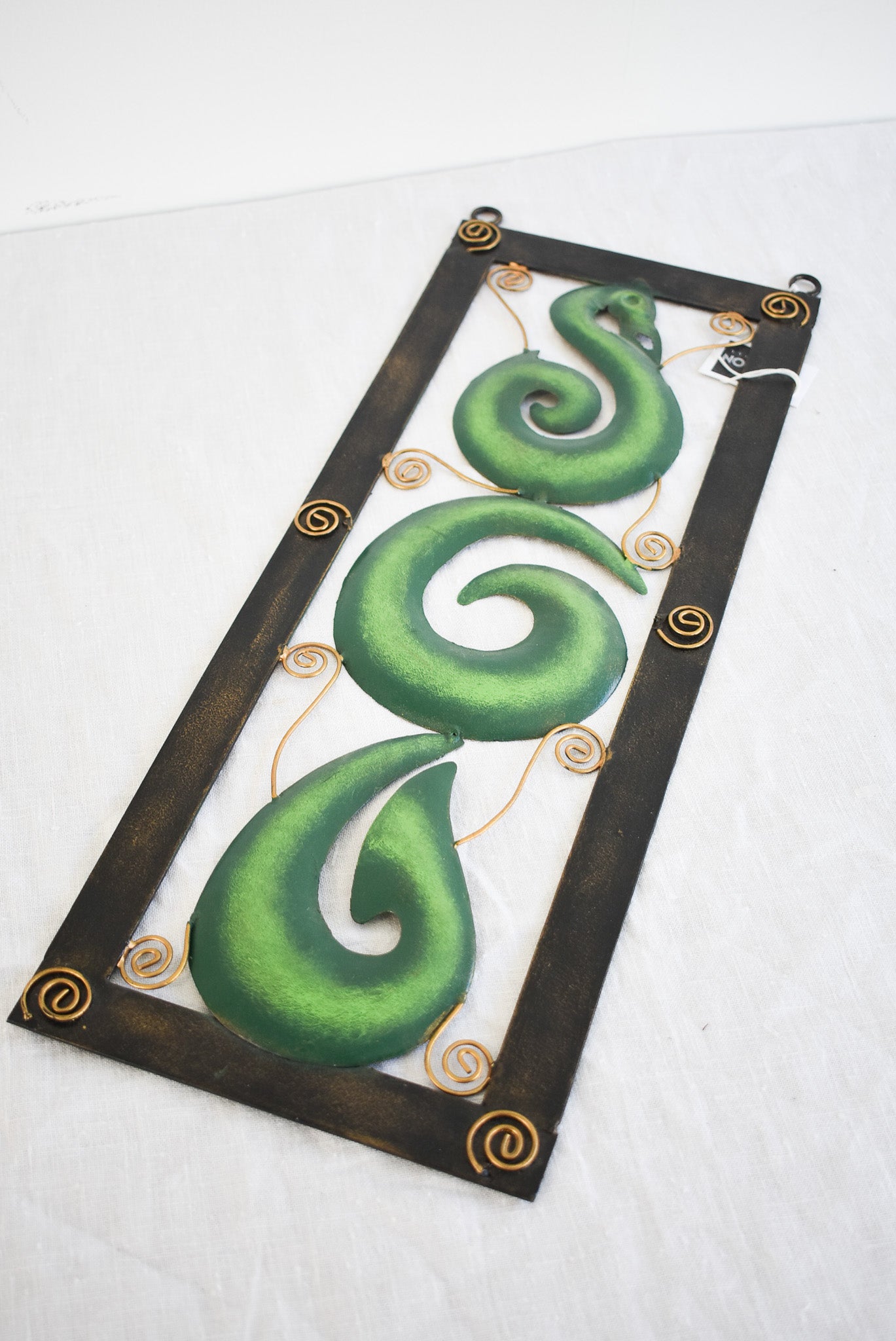 Handcrafted Koru metalwork decor