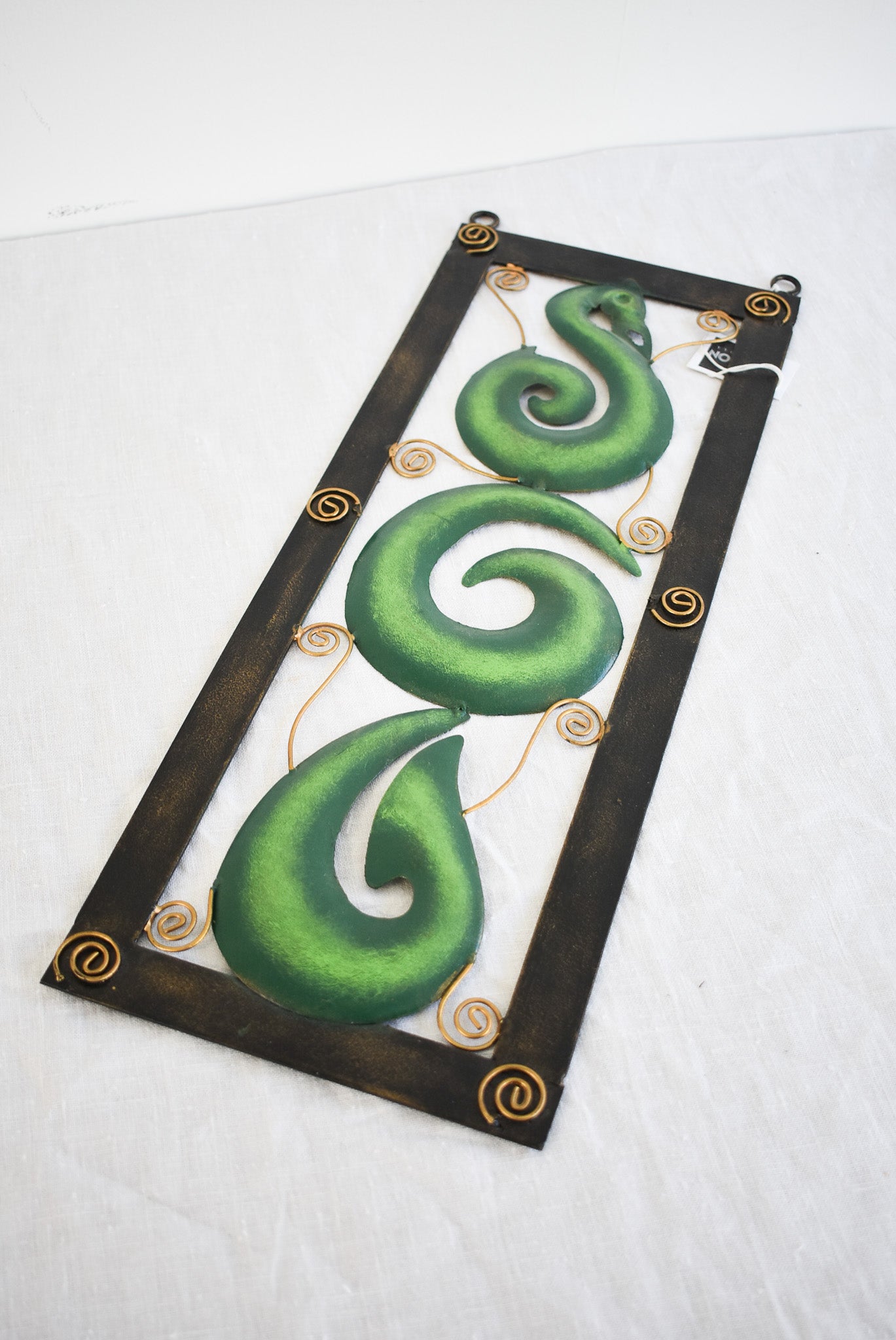 Handcrafted Koru metalwork decor