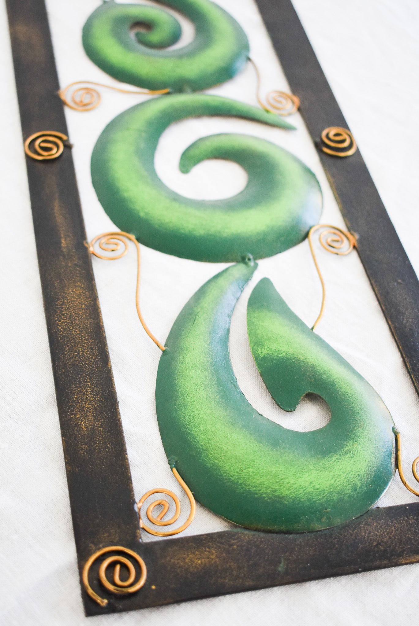 Handcrafted Koru metalwork decor