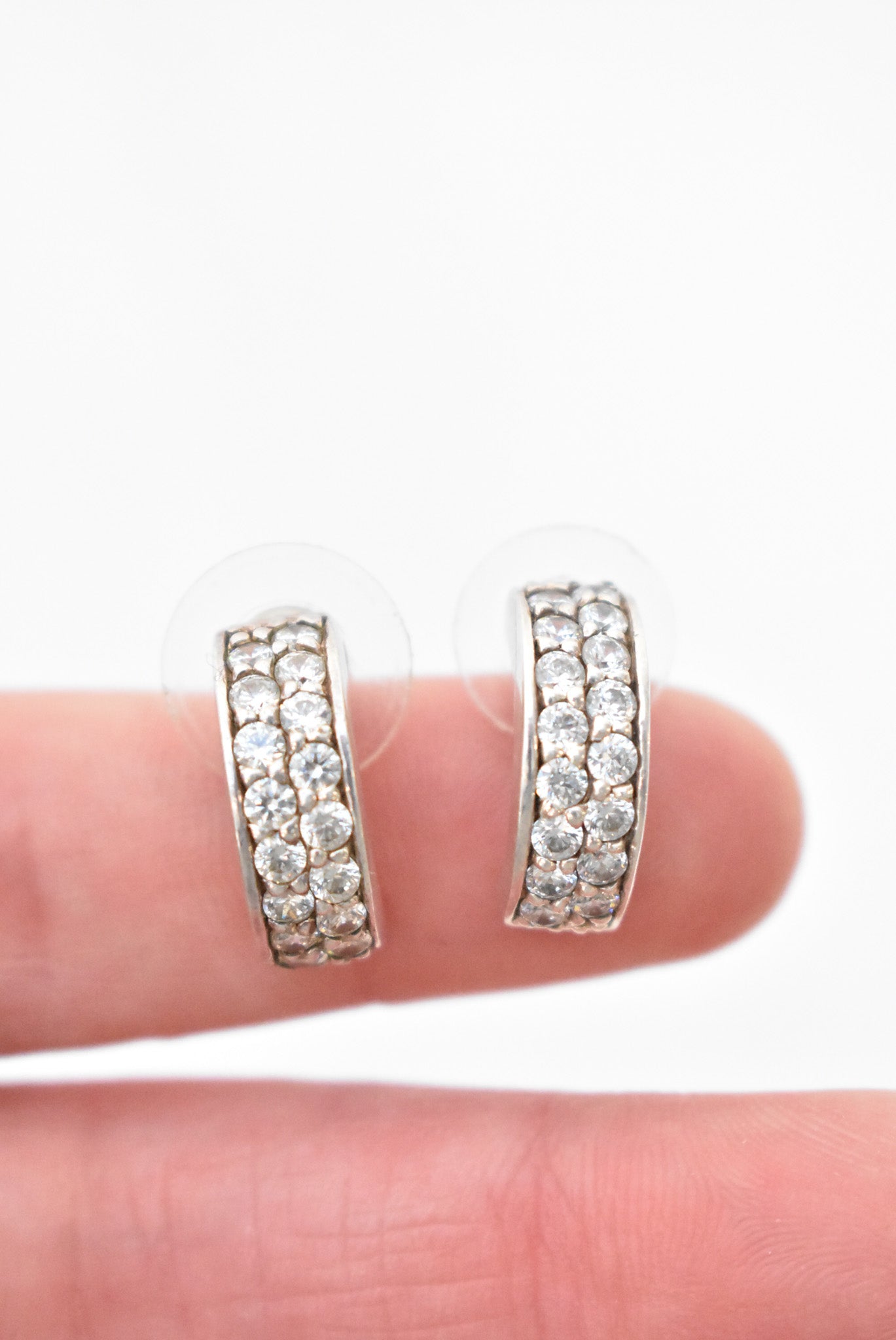 Cubic zirconia half hoop silver earrings