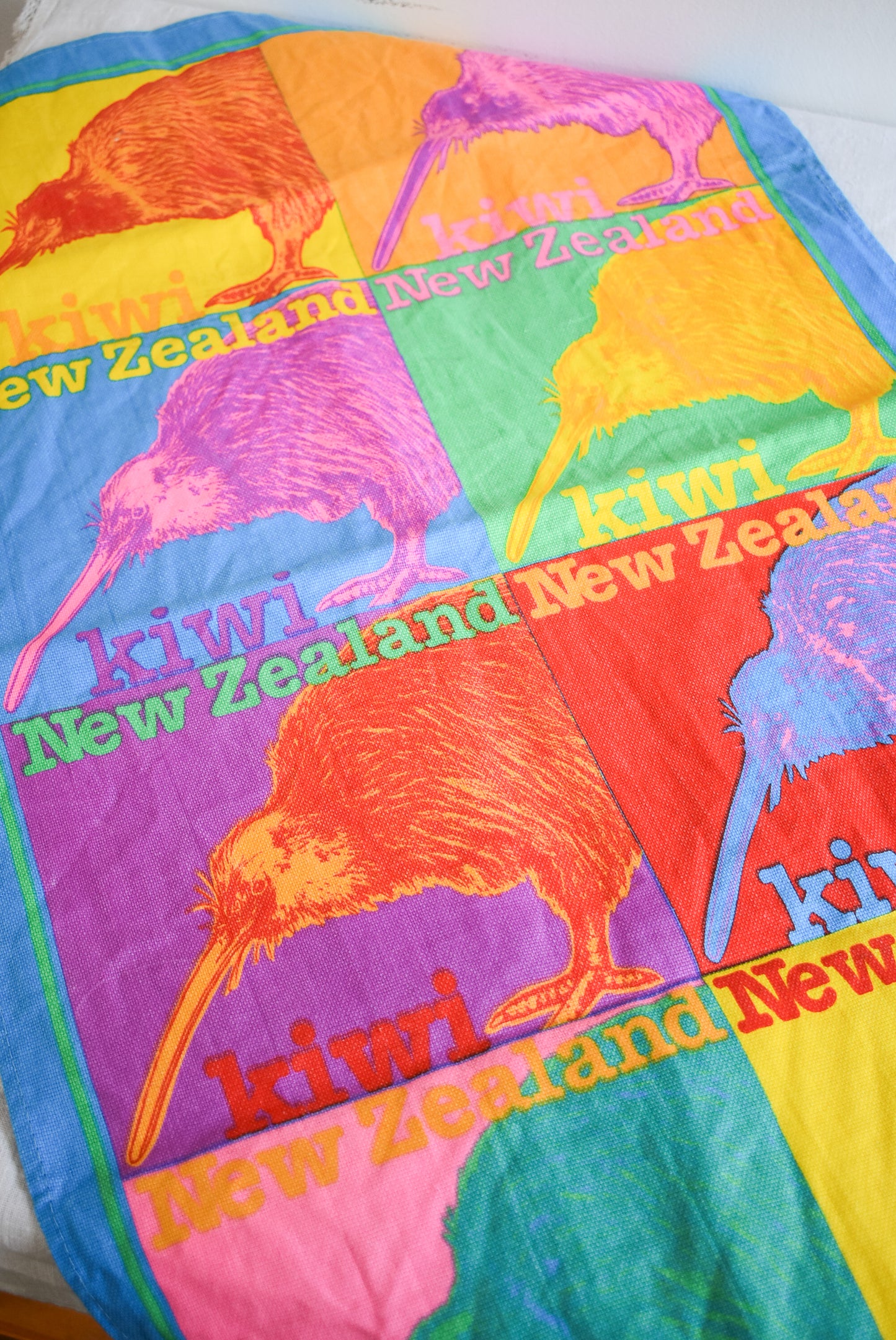 Funky bright Kiwis cotton tea towel