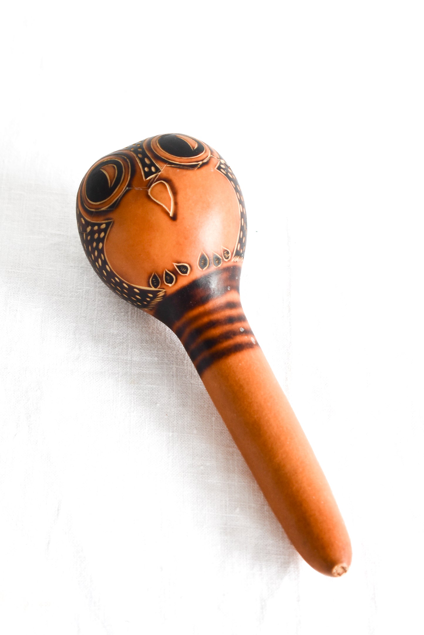 Handcrafted gourd baby rattle