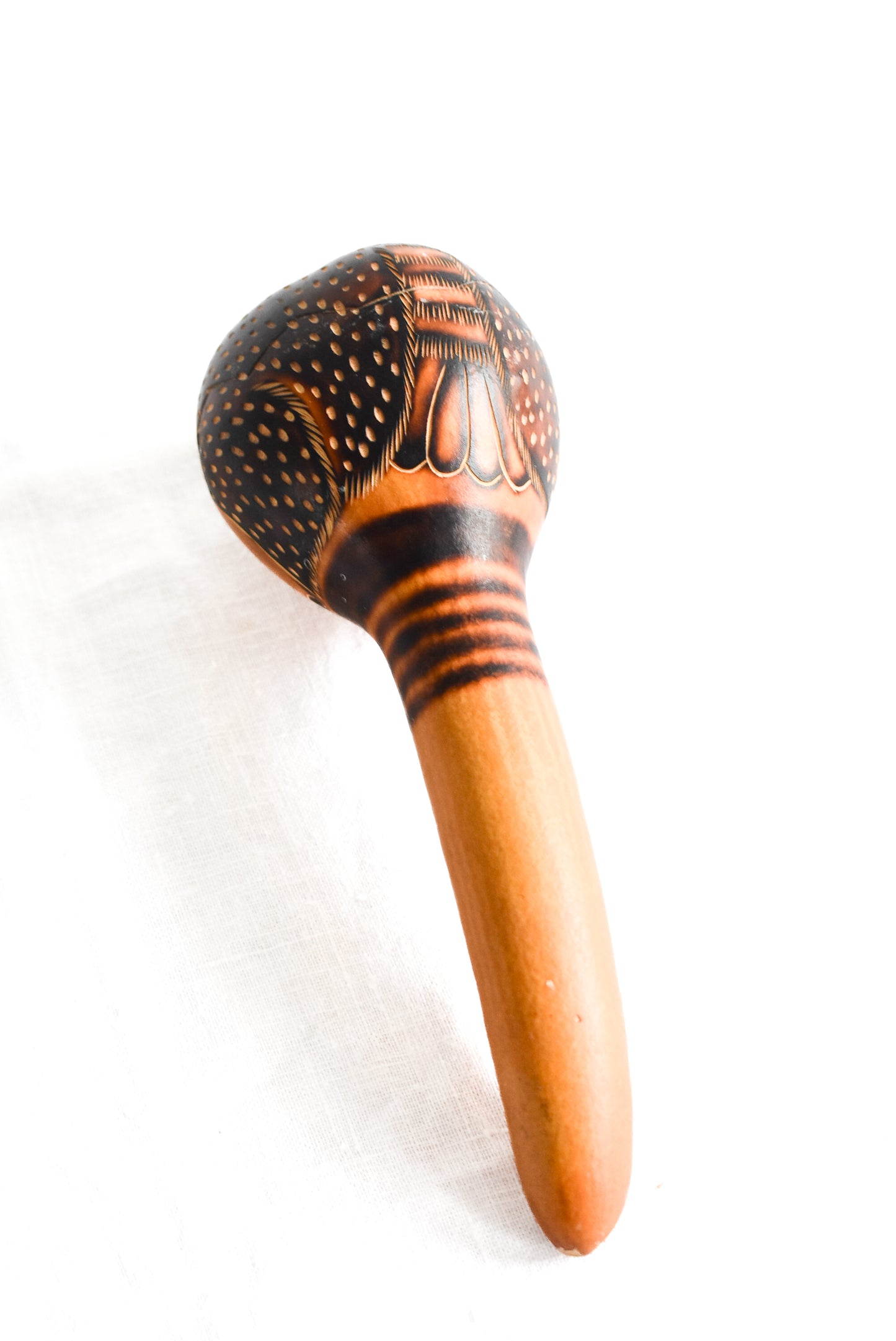 Handcrafted gourd baby rattle