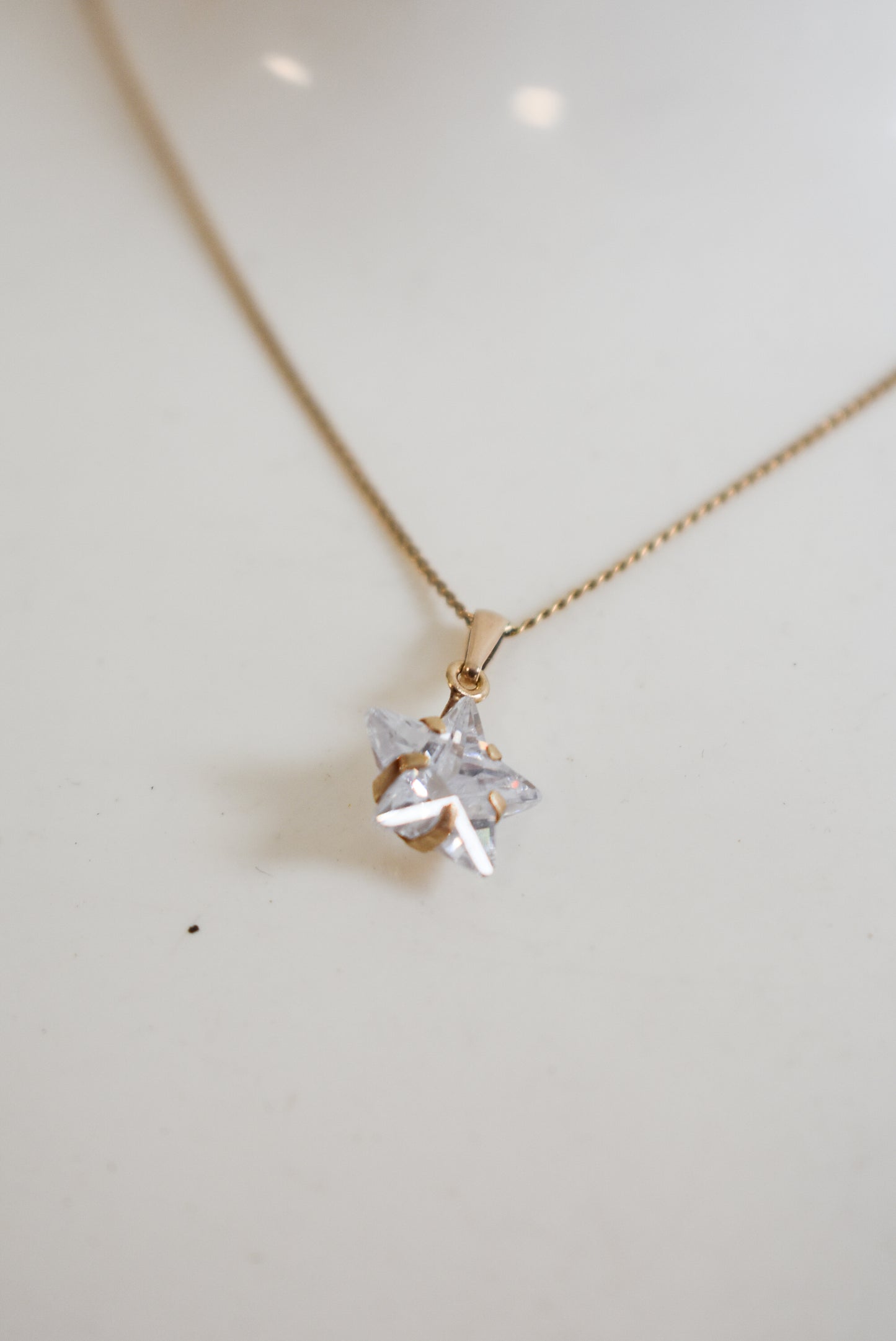 Gorgeous 9ct gold CZ star necklace